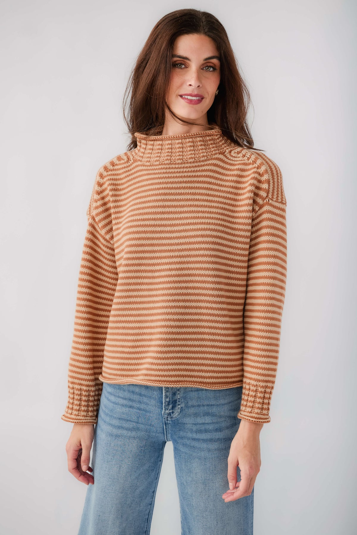 Orange-and-cream striped long-sleeve funnel neck sweater