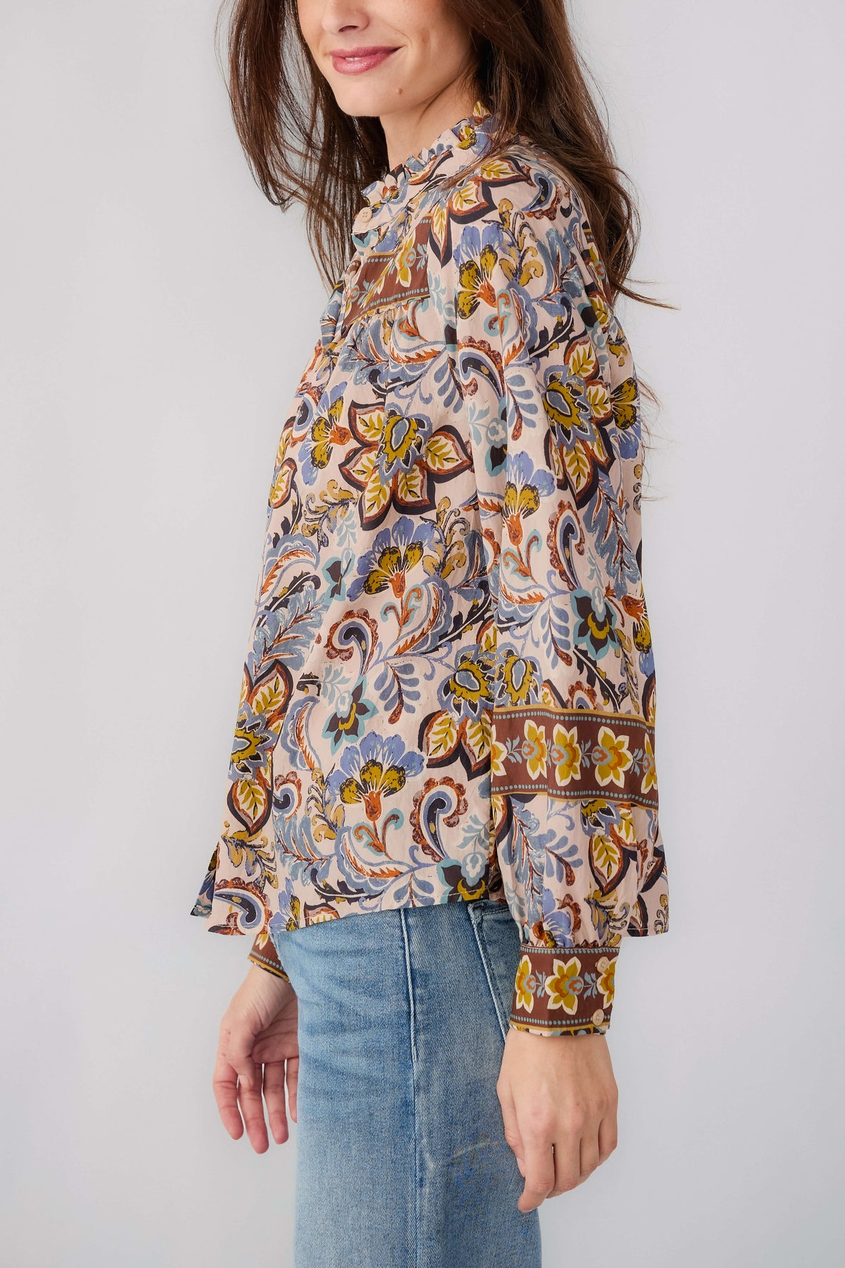 Beige button-down ruffle-collar blouse with ornate border paisley print, long sleeves