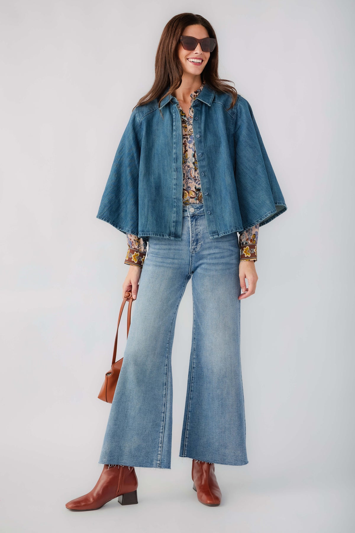 Denim kimono jacket with button front, flared sleeves, and patterned cuffs
