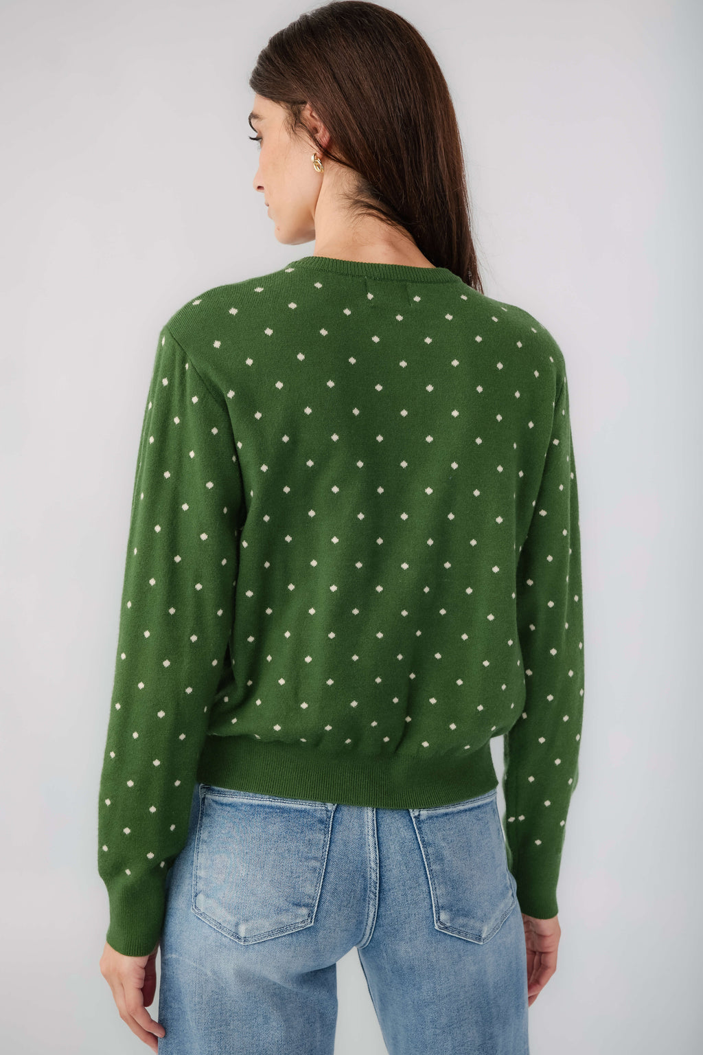 Green polka-dot cardigan back view with long sleeves and button placket