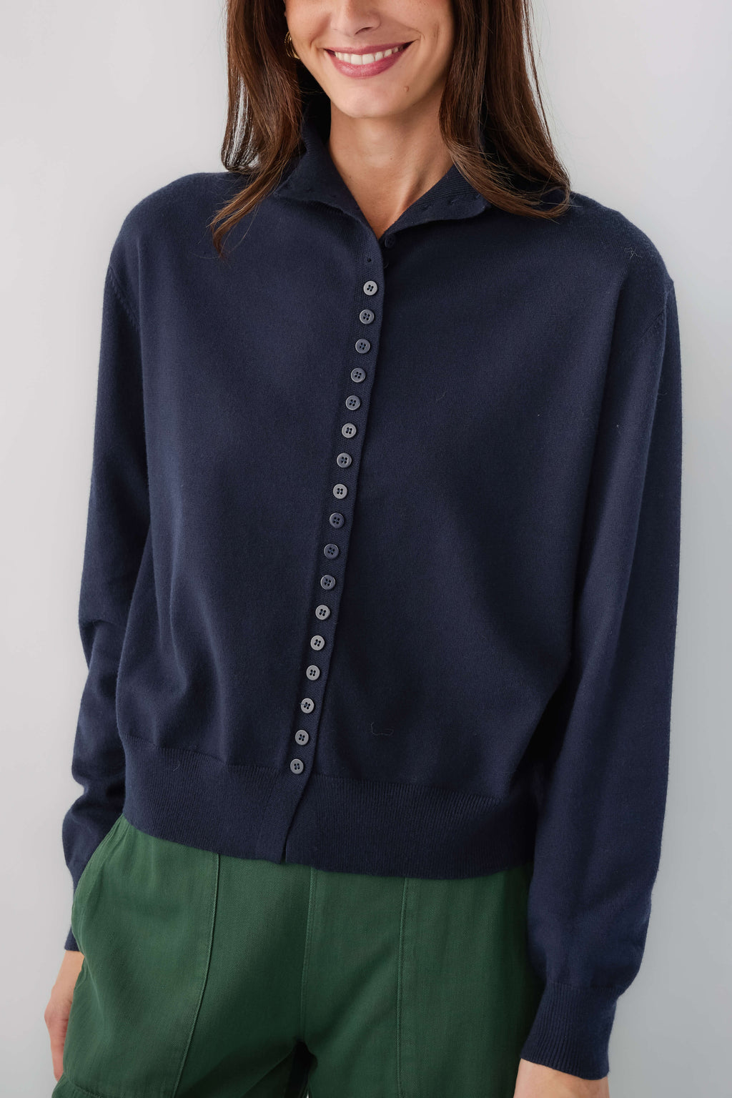 Mockneck cardigan in dark navy with button-front placket and long sleeves
