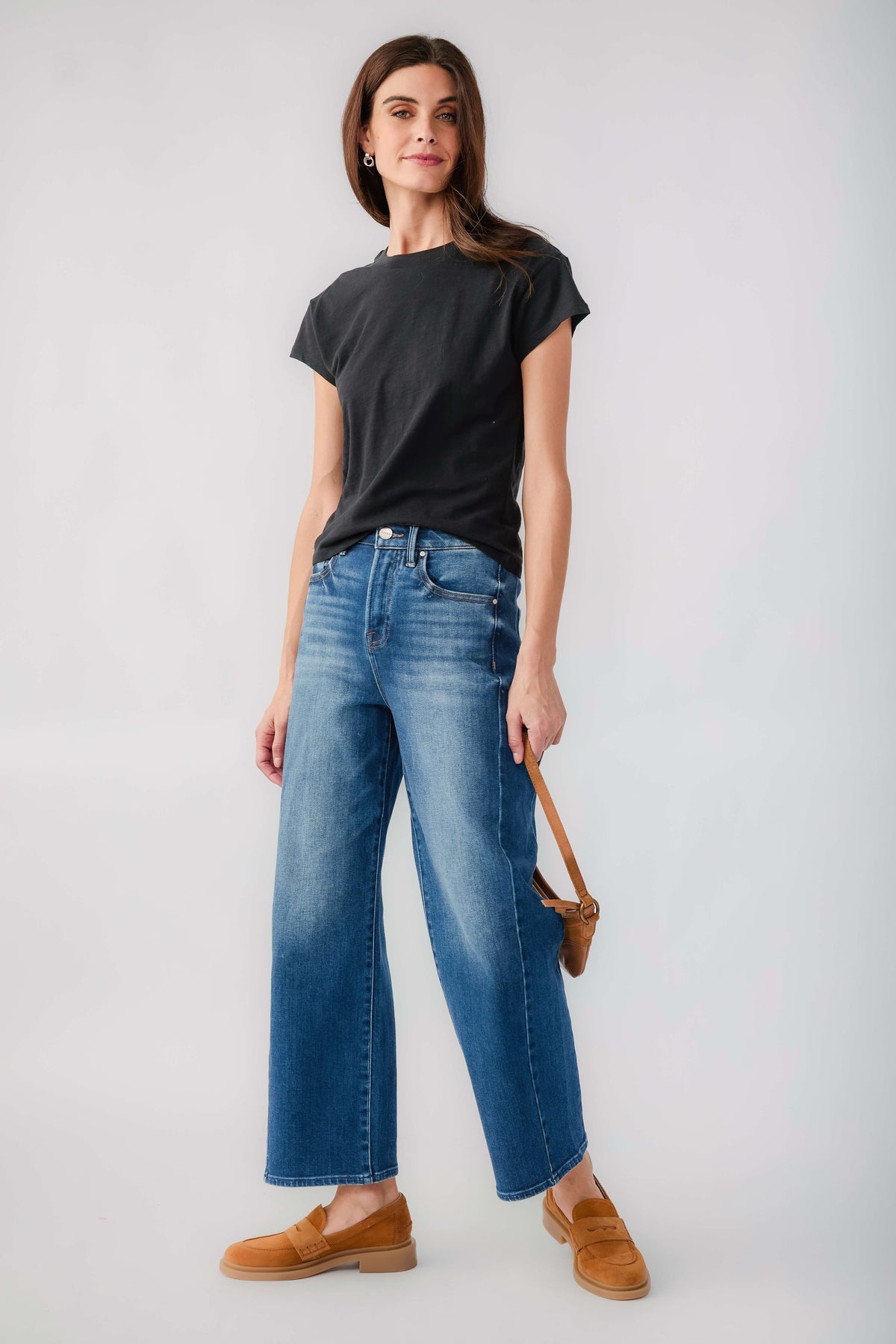 Women's black short-sleeve slub tee with crew neck, full-body view