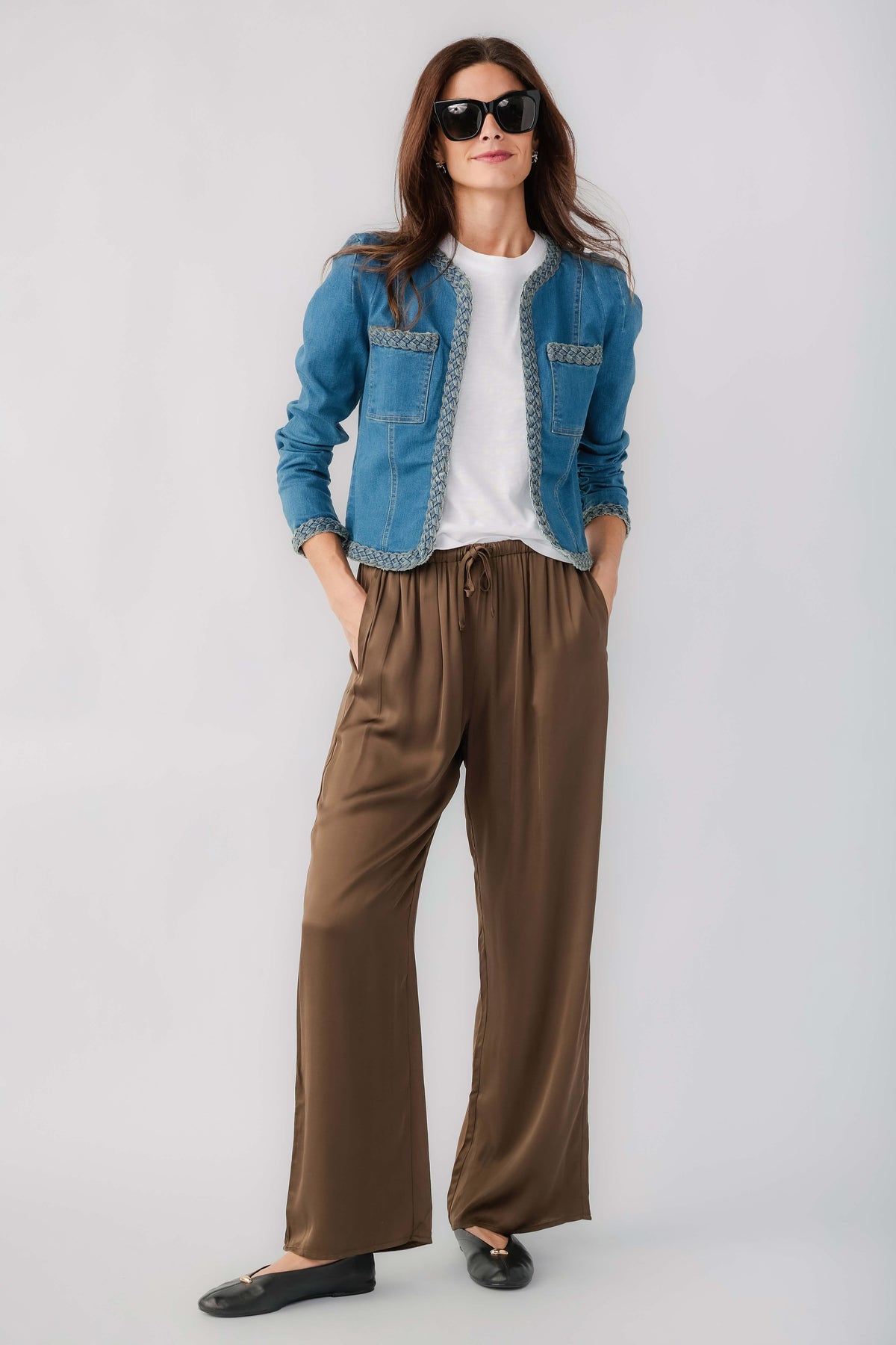 Olive satin wide-leg pants with elastic drawstring waistband and flowing wide legs