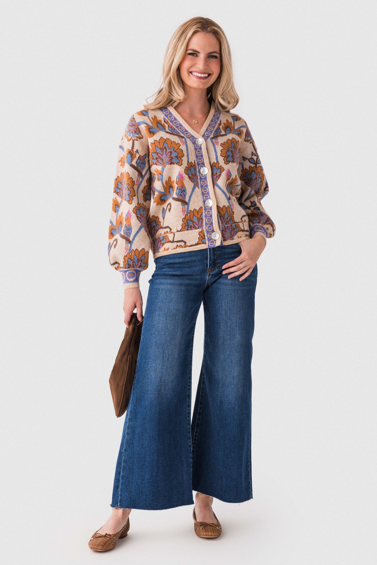 Dark blue raw-hem palazzo jeans with front pockets and wide leg flare