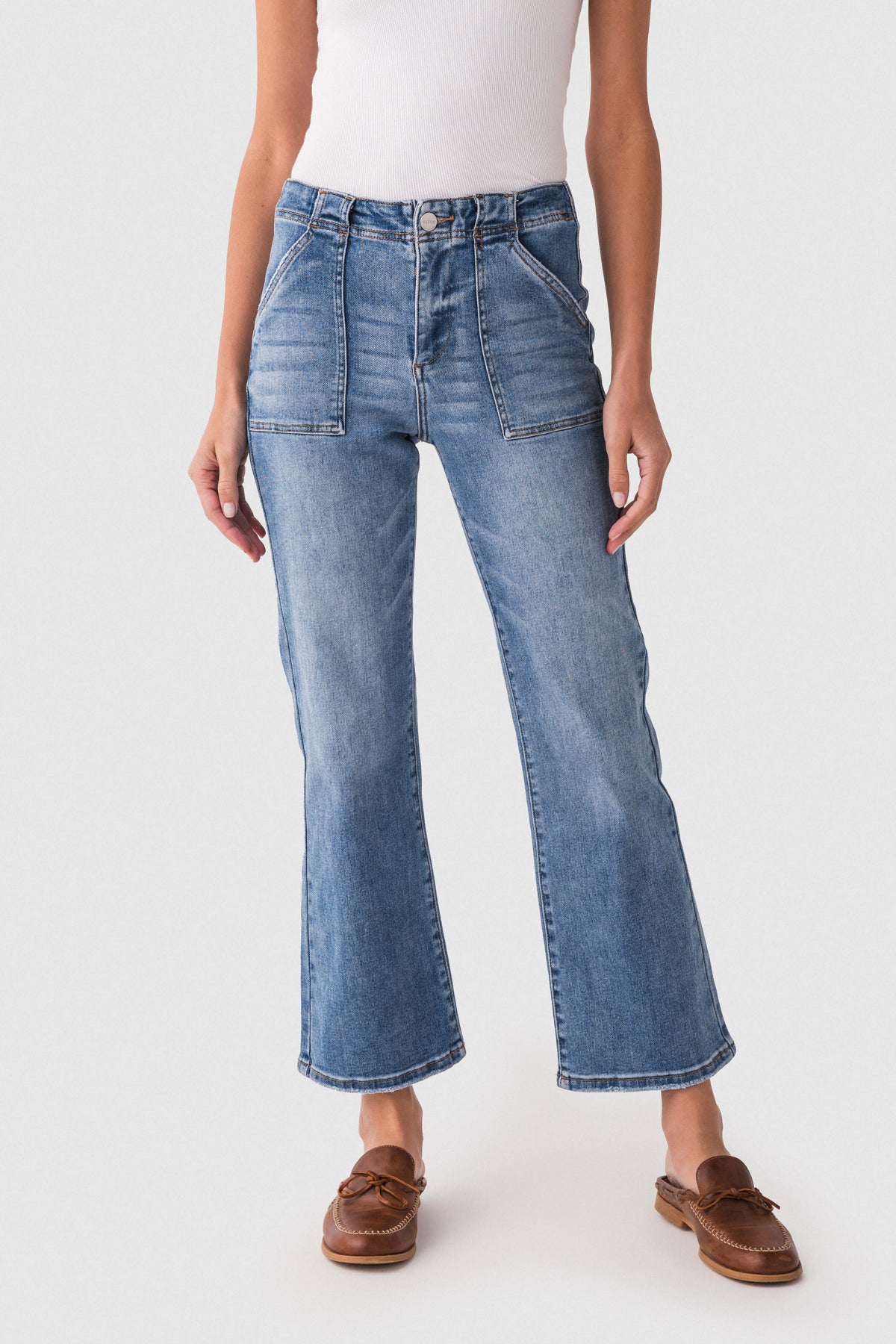Dark blue ankle flare jeans front view with five-pocket seam details