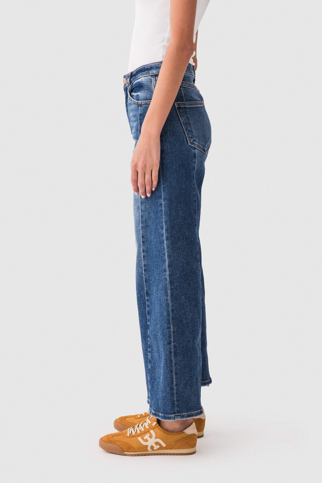 Dark blue high-rise barrel jeans with wide straight legs and five-pocket styling