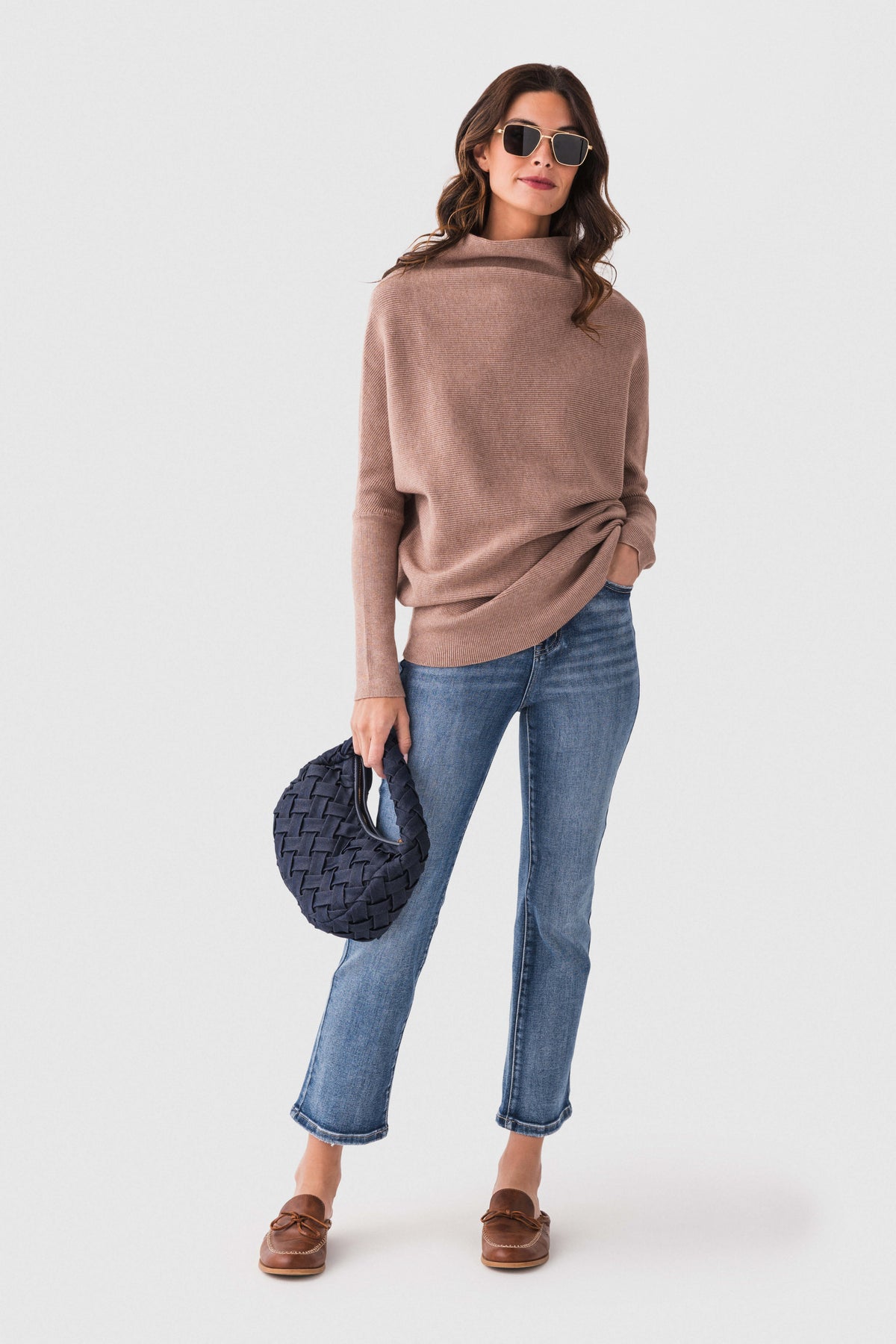 Latte taupe dolman pullover sweater with slouch neck and long sleeves, front view.