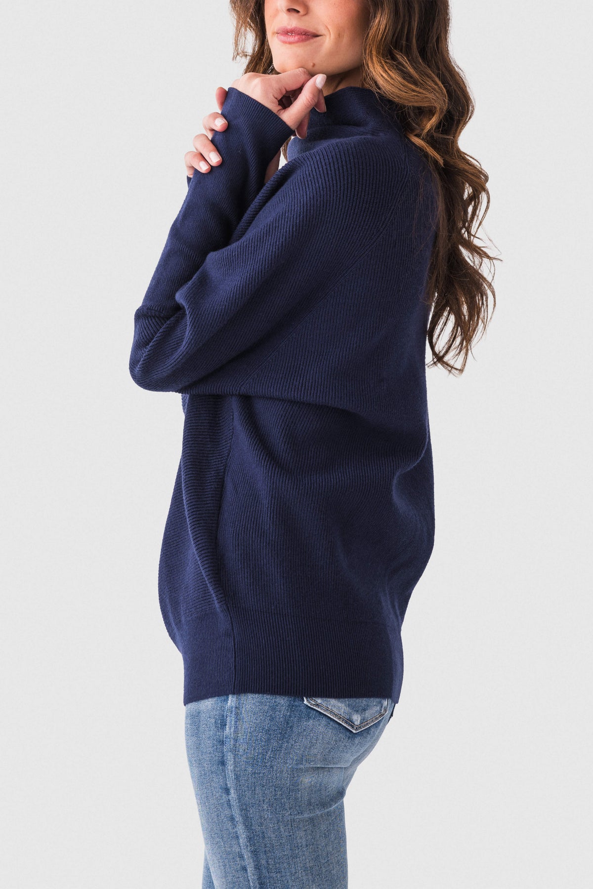 Navy slouch-neck dolman pullover sweater with long sleeves and side view