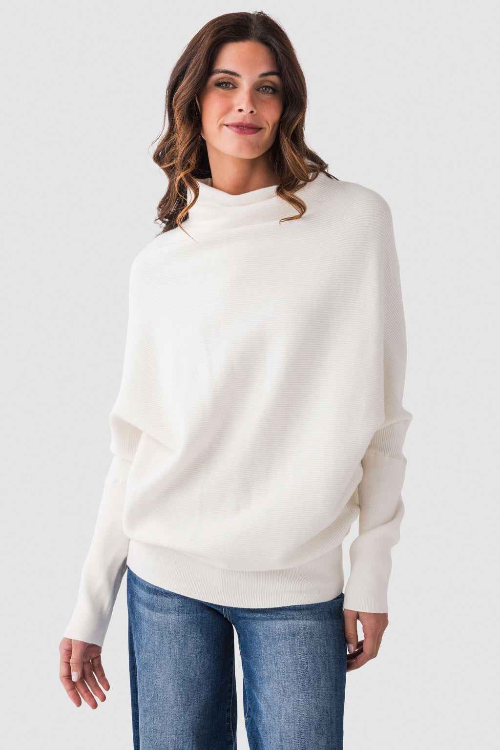 Cream slouch-neck dolman pullover sweater with long sleeves and front view
