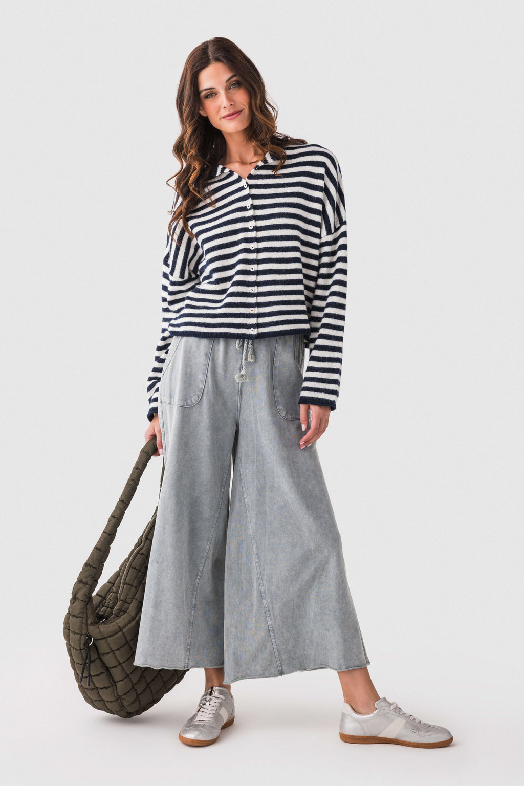 Navy-and-white striped button-front cardigan with long sleeves and ribbed bottom
