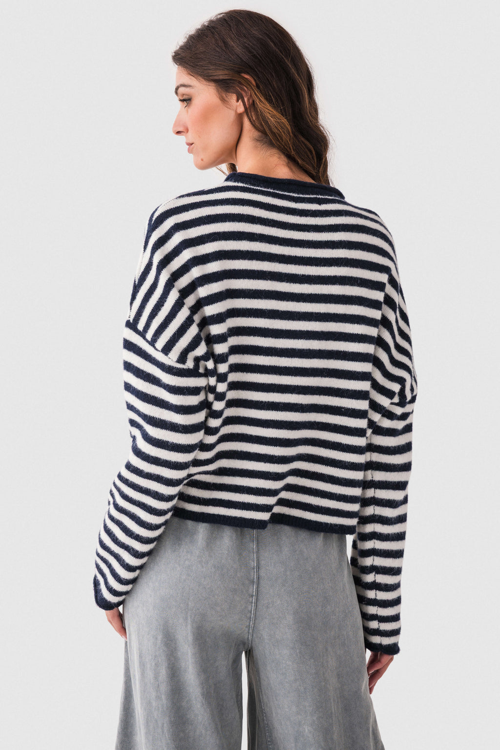 Green and white striped cardigan with long sleeves and crew neck rib trim