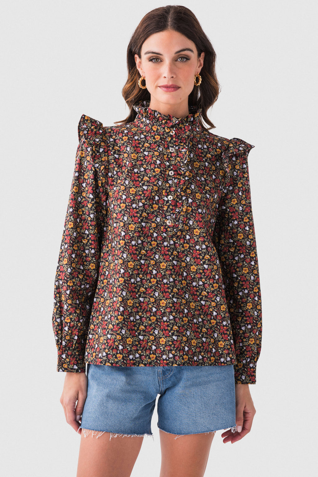 Black floral ruffle detail top, front view with high neck and long sleeves