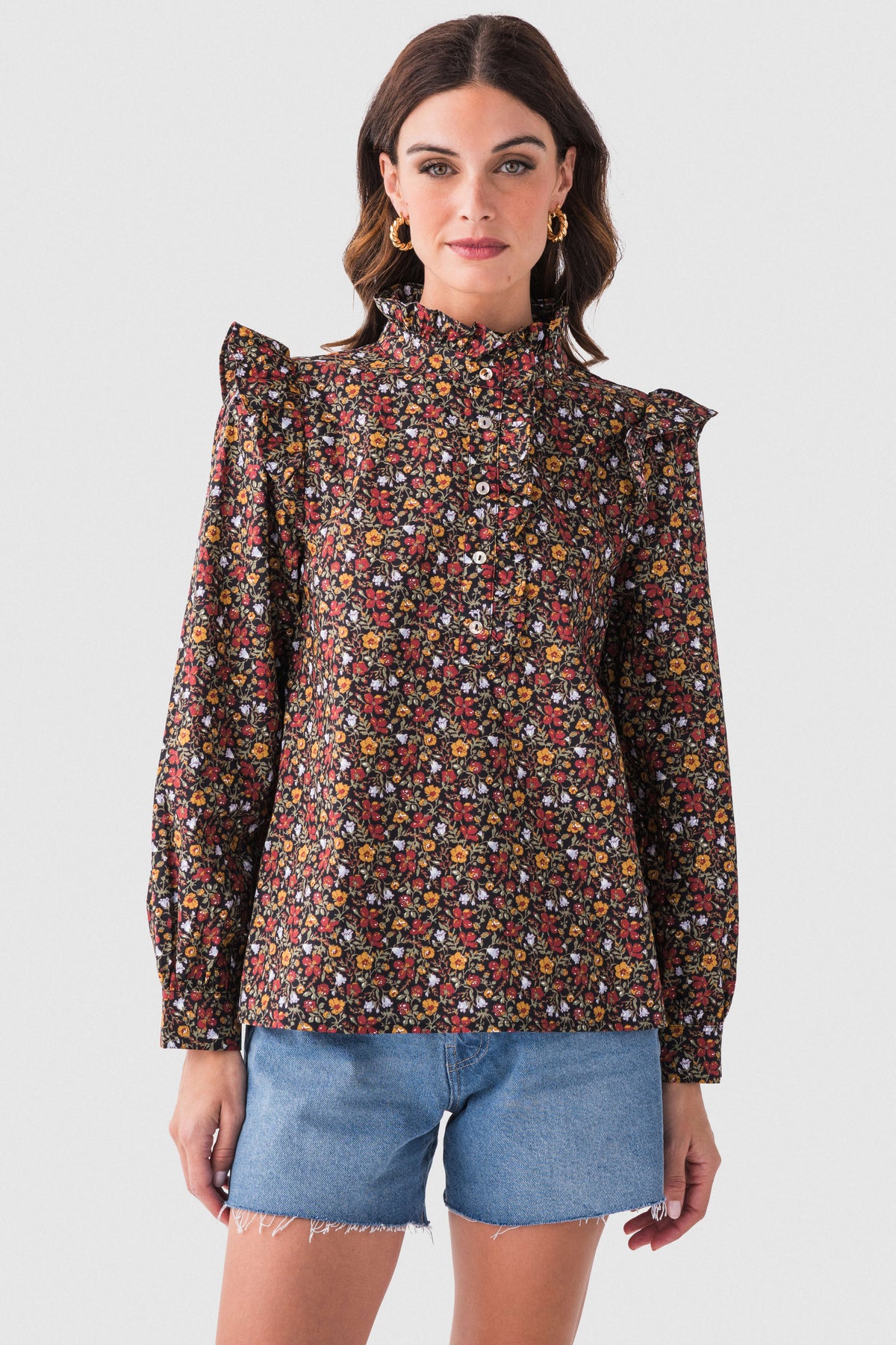 Black floral ruffle detail top, front view with high neck and long sleeves