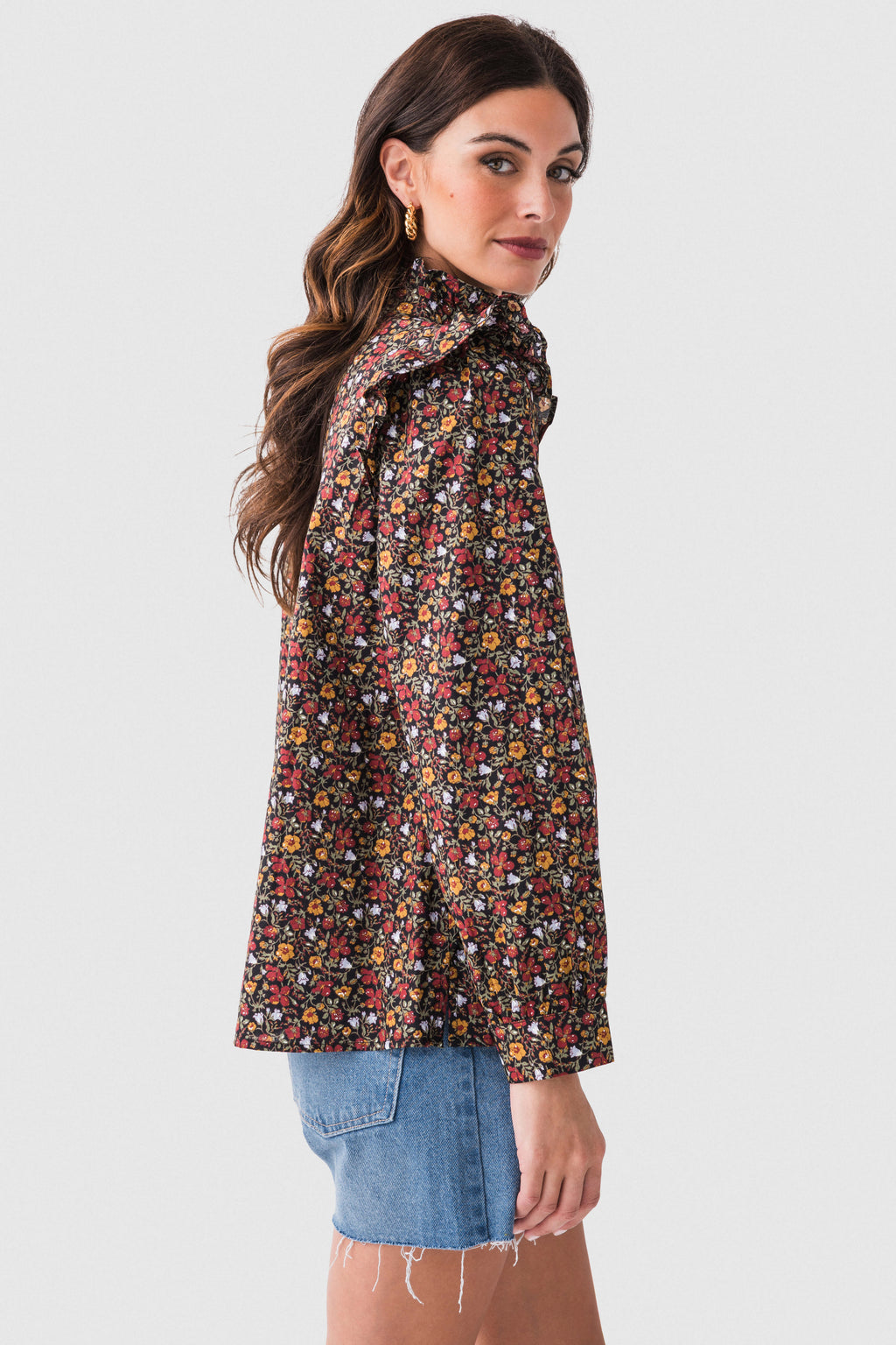 Black floral ruffle detail top with high collar and long sleeves, ruffled shoulders detail