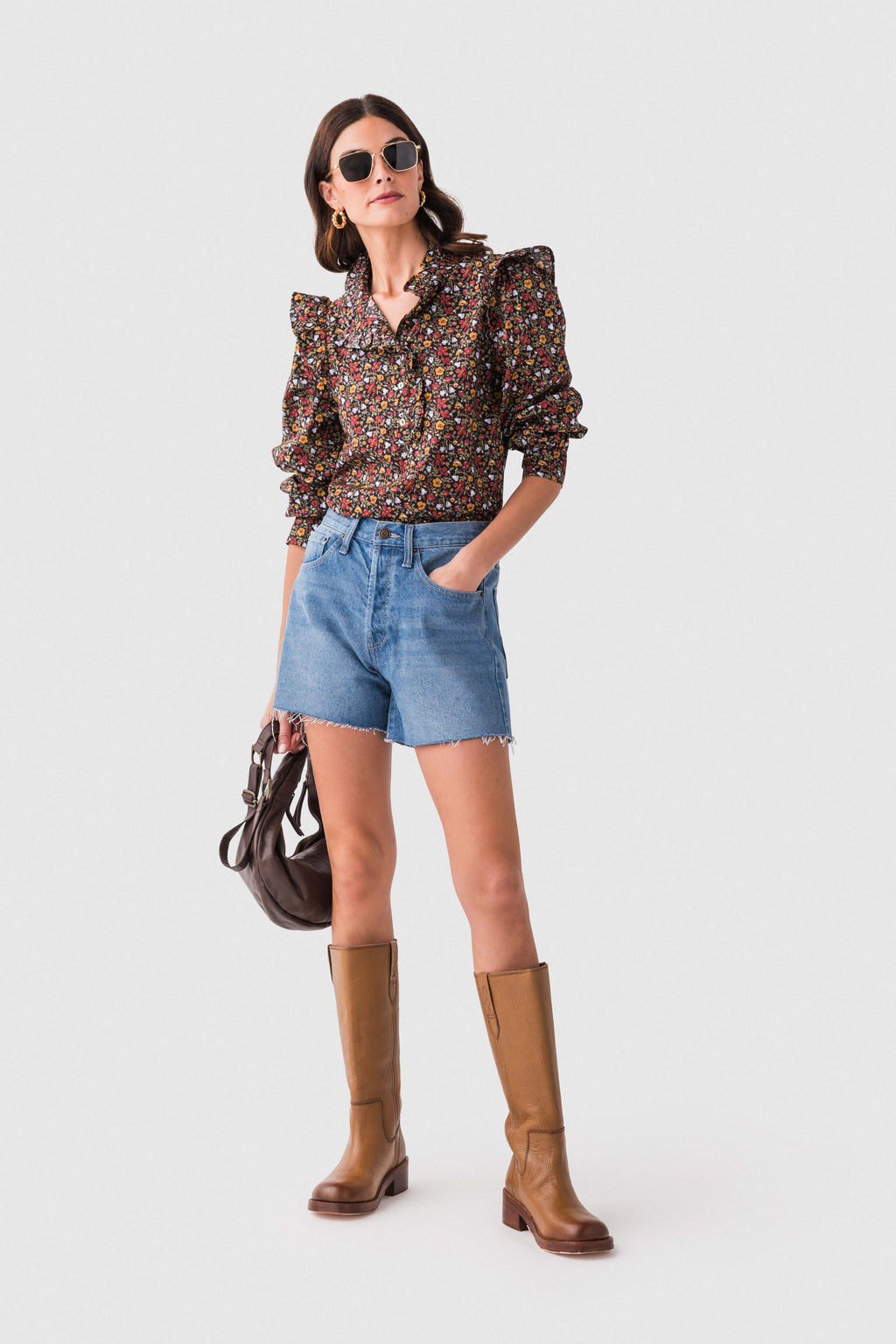 Black floral ruffle detail top with high neck and long sleeves, ruffled shoulder details