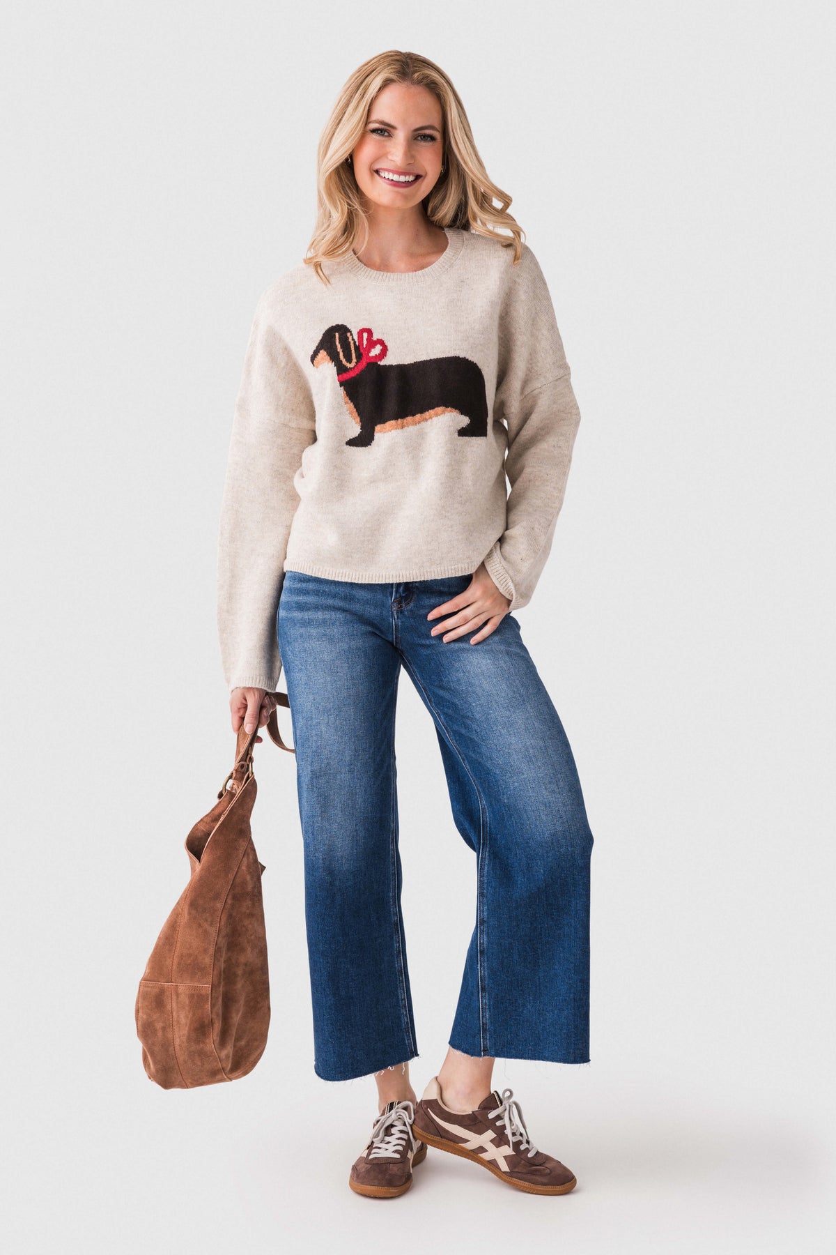 High-rise wide-leg light wash denim jeans with cropped wide leg and raw hem