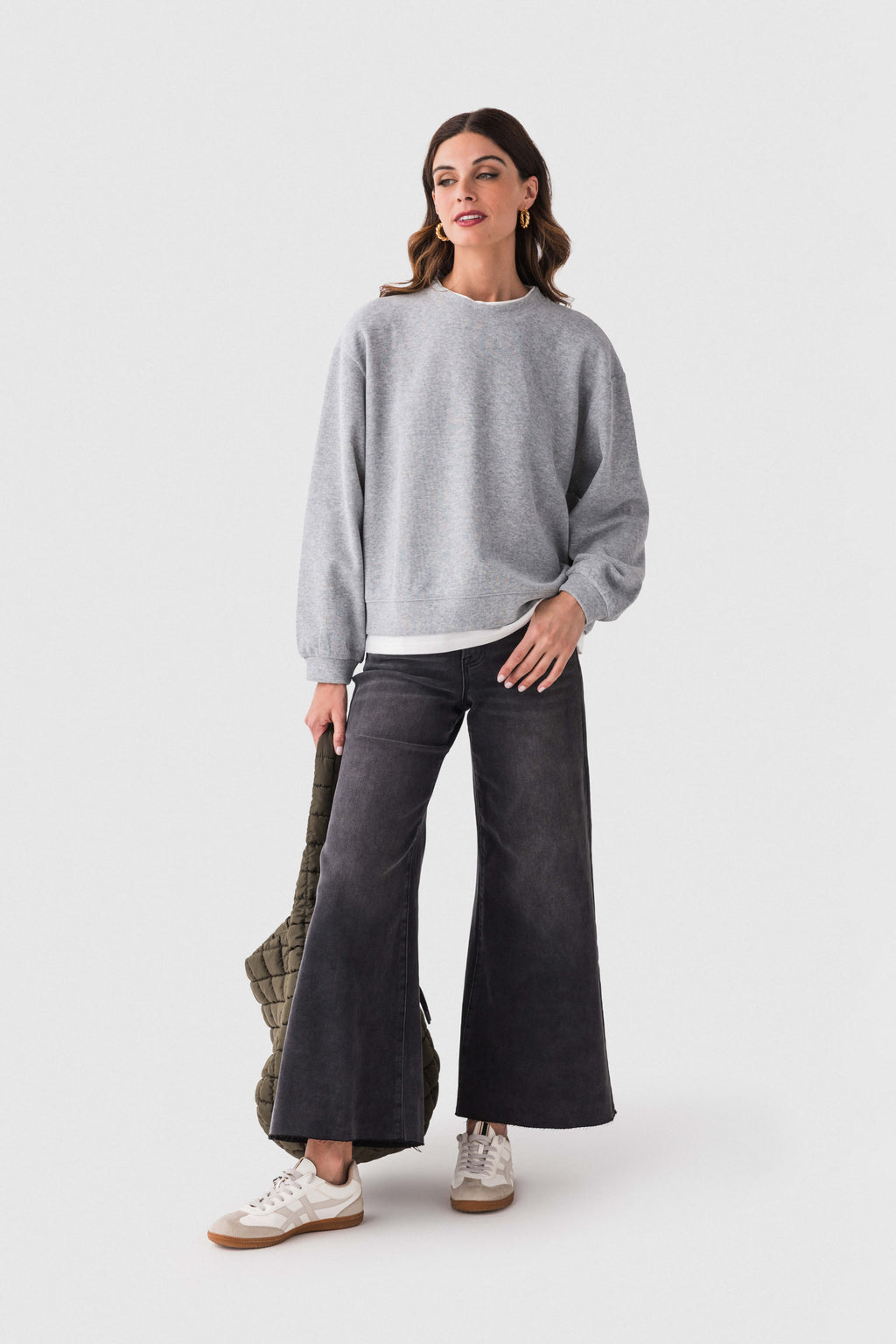 Washed black raw-hem palazzo jeans with wide legs and contrast top stitching