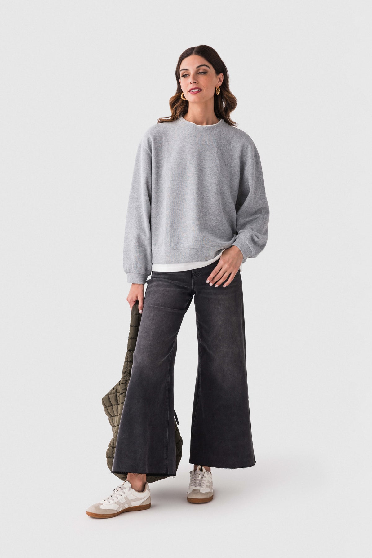 Washed black raw-hem palazzo jeans with wide legs and contrast top stitching
