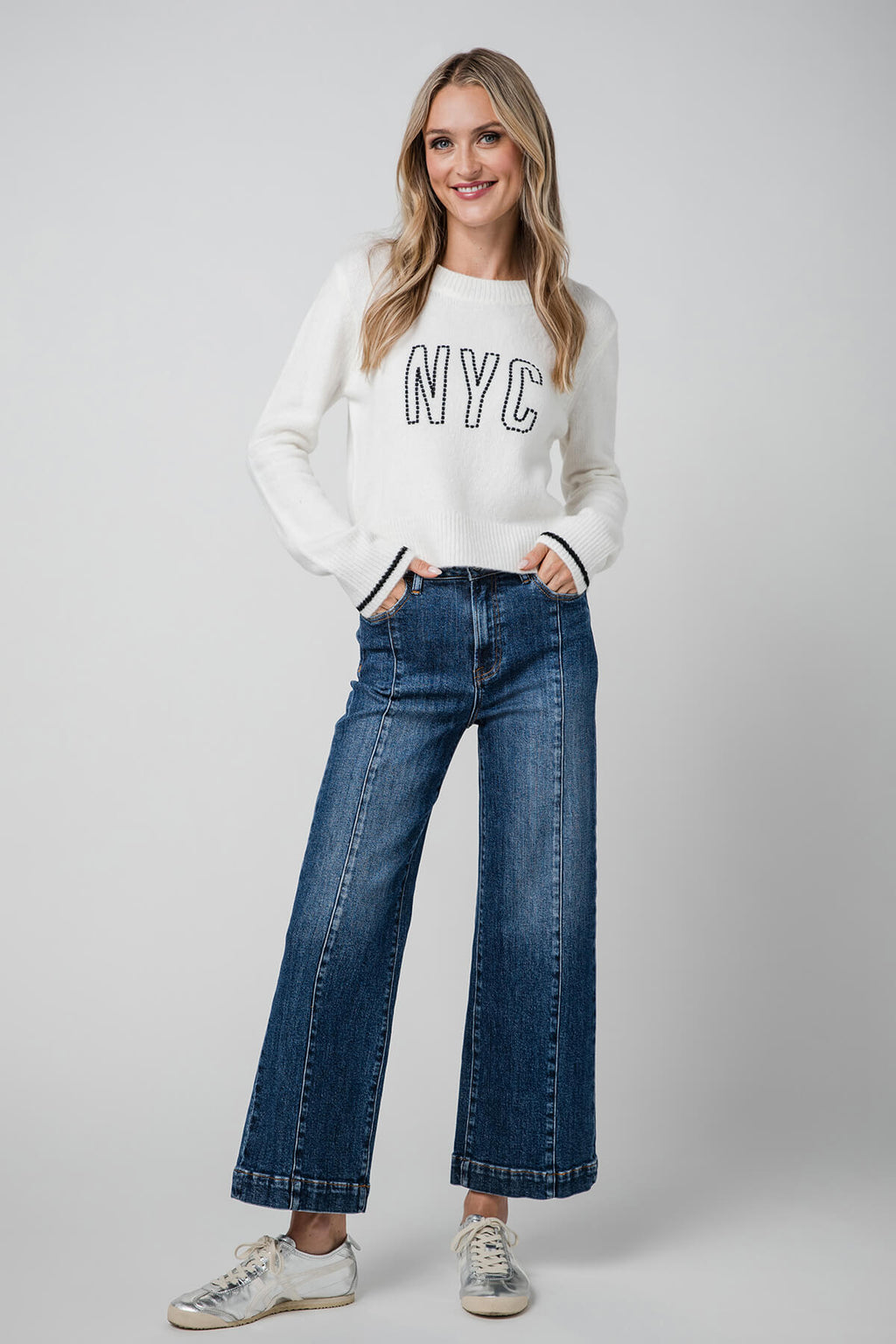 High-rise wide-leg ankle jeans in medium blue denim, full front view with wide straight legs