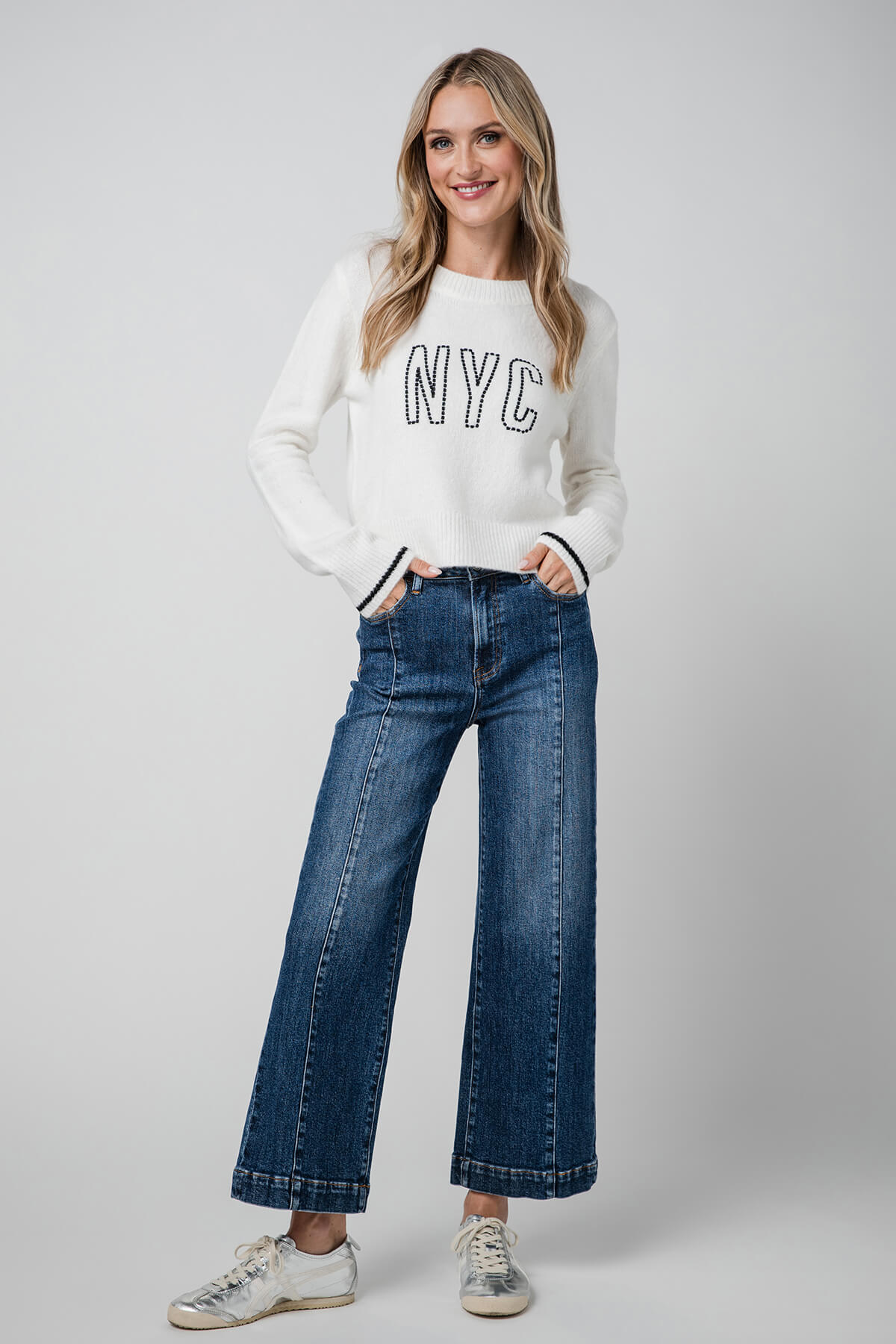 High-rise wide-leg ankle jeans in medium blue denim, full front view with wide straight legs