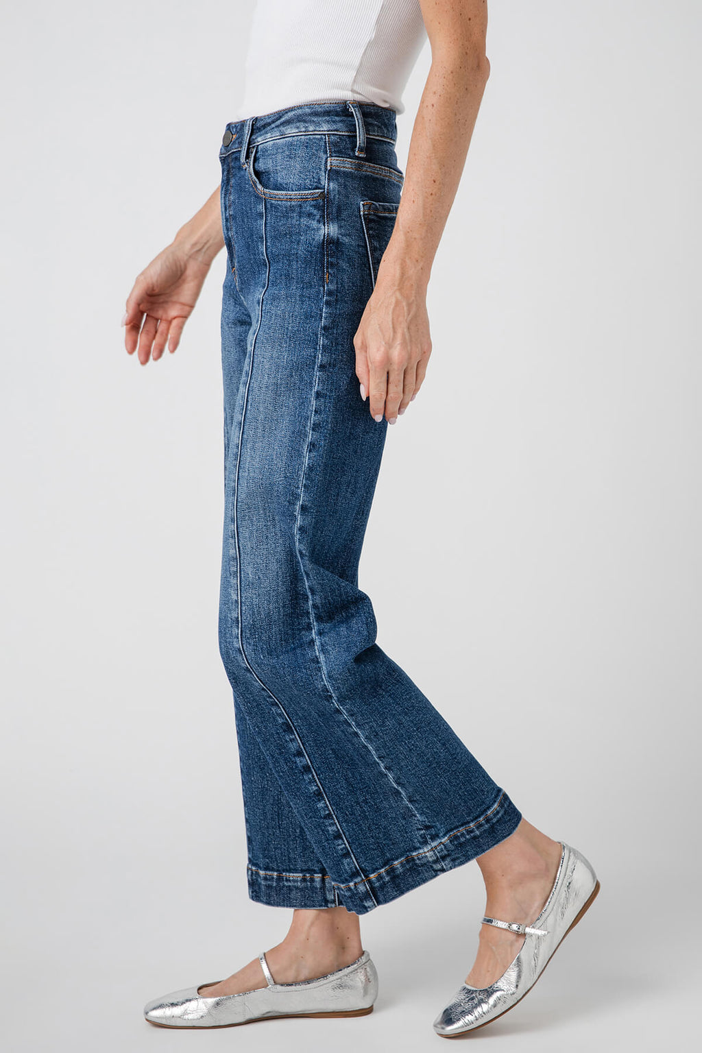 High-rise wide-leg ankle jeans in medium blue denim, back view with belt loops
