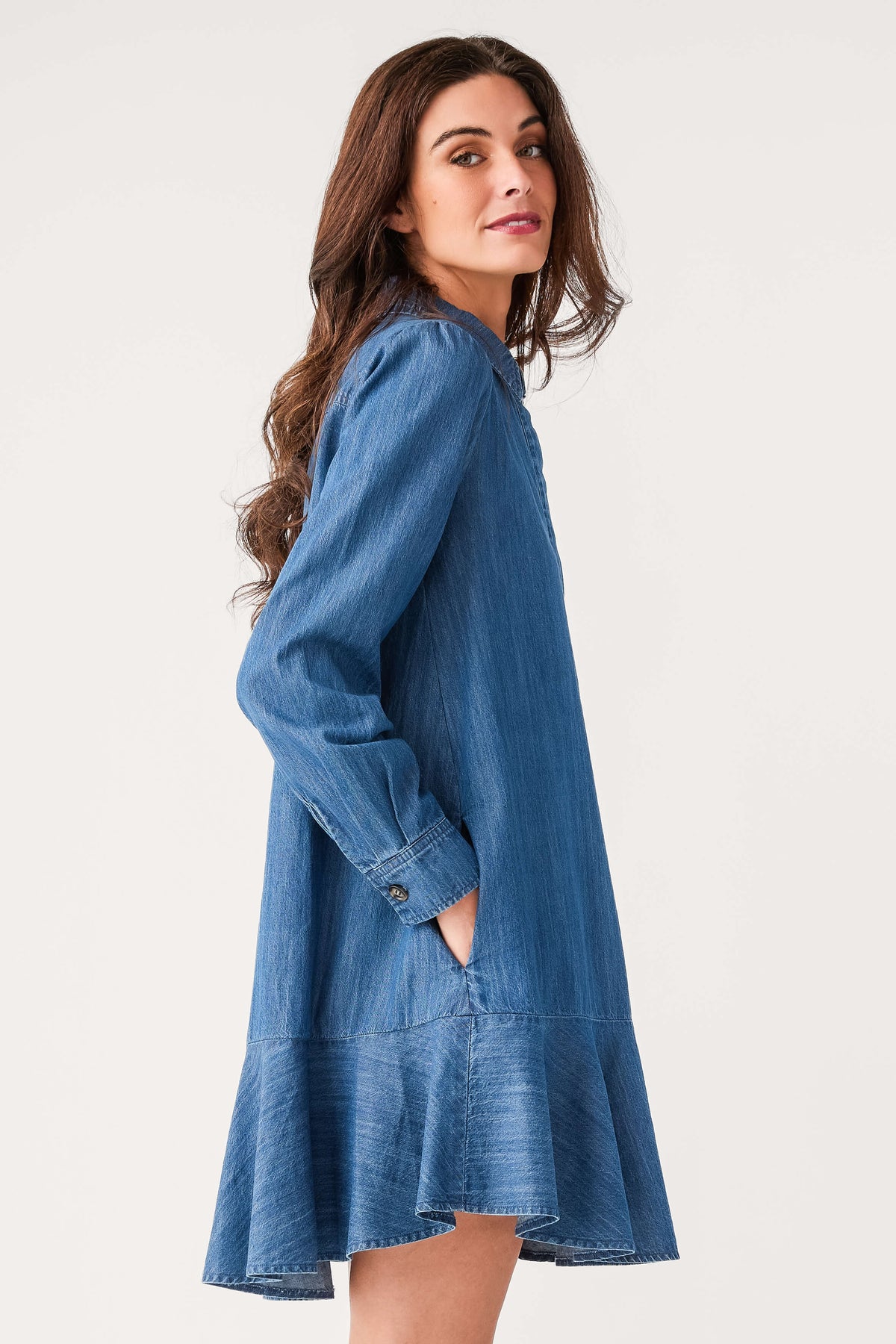 Blue denim shirt dress, long sleeves, side button detail and flared tiered hem