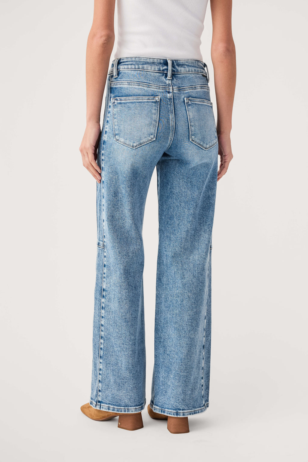 High-rise medium-wash wide-leg jeans with belt loops and back patch pockets