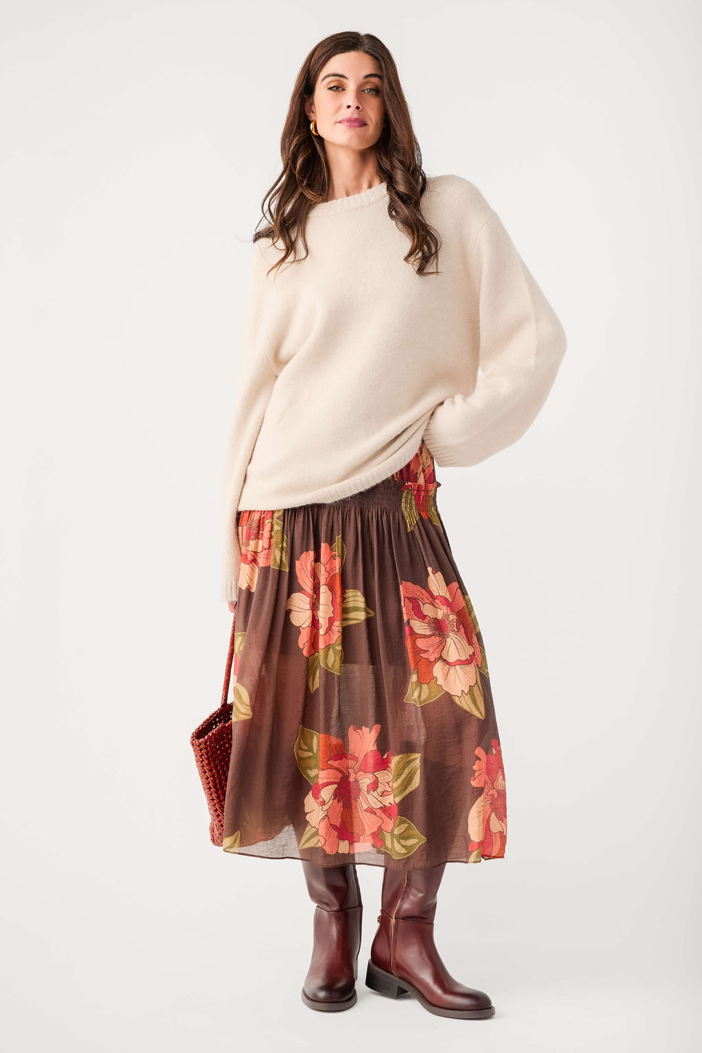 Brown floral maxi skirt with elastic gathered waistband and flowing tiers