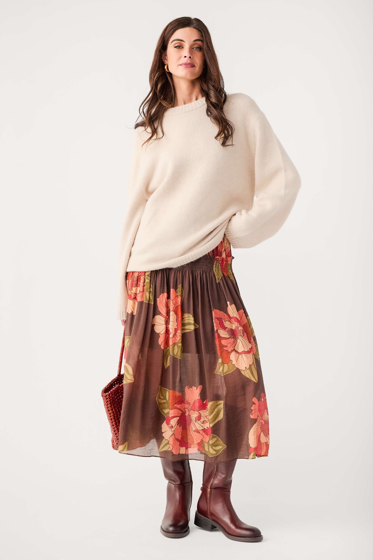 Brown floral maxi skirt with elastic gathered waistband and flowing tiers