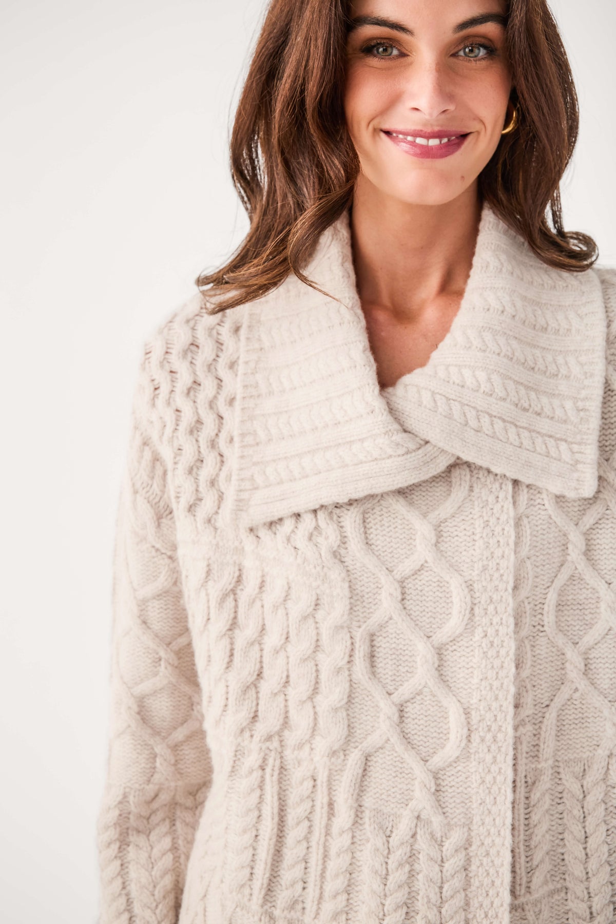 Oat cable-knit wrap cardigan close-up: textured pattern and shawl collar