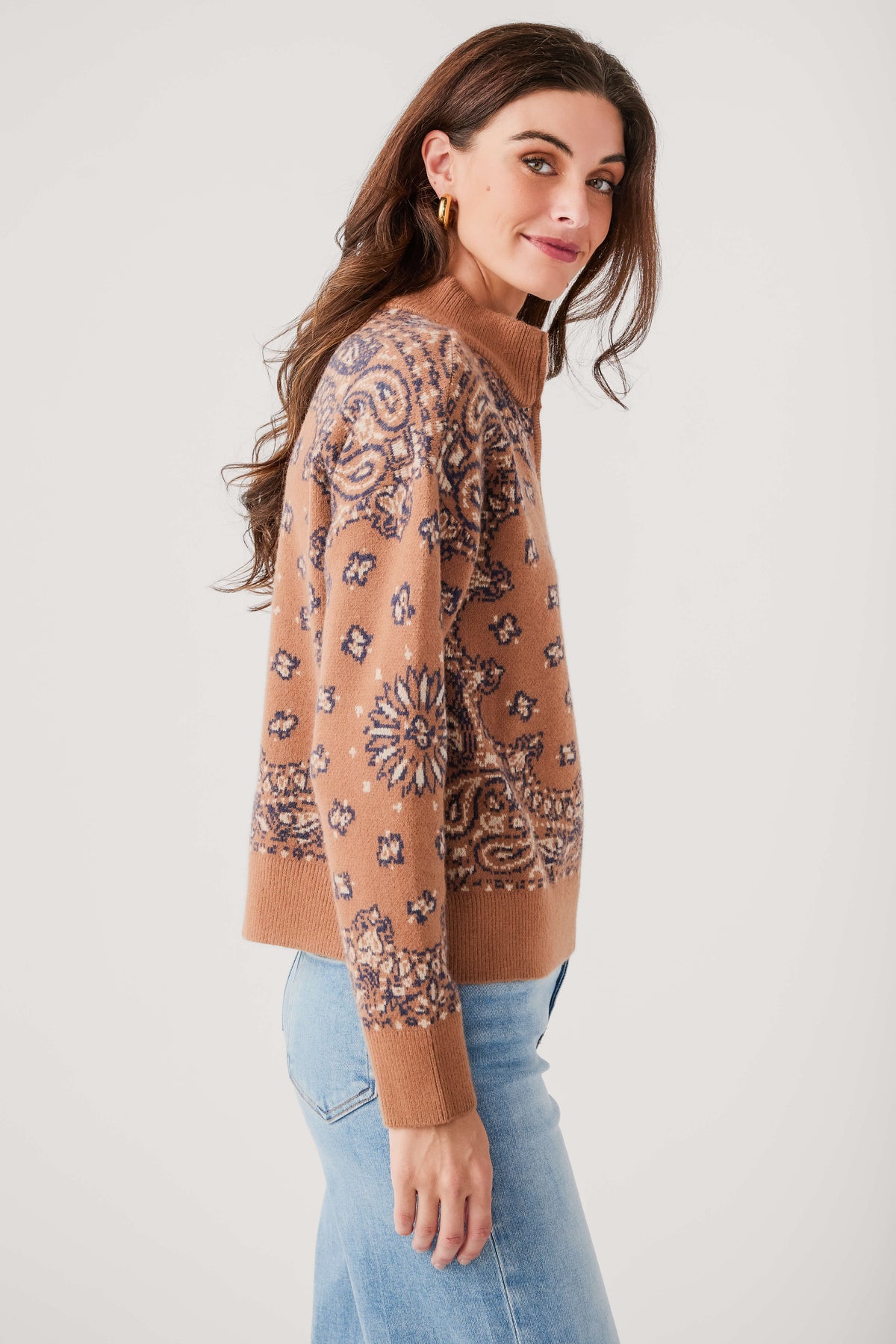 Caramel bandana-print 1/4 zip sweater, side profile with long sleeves and ribbed hem