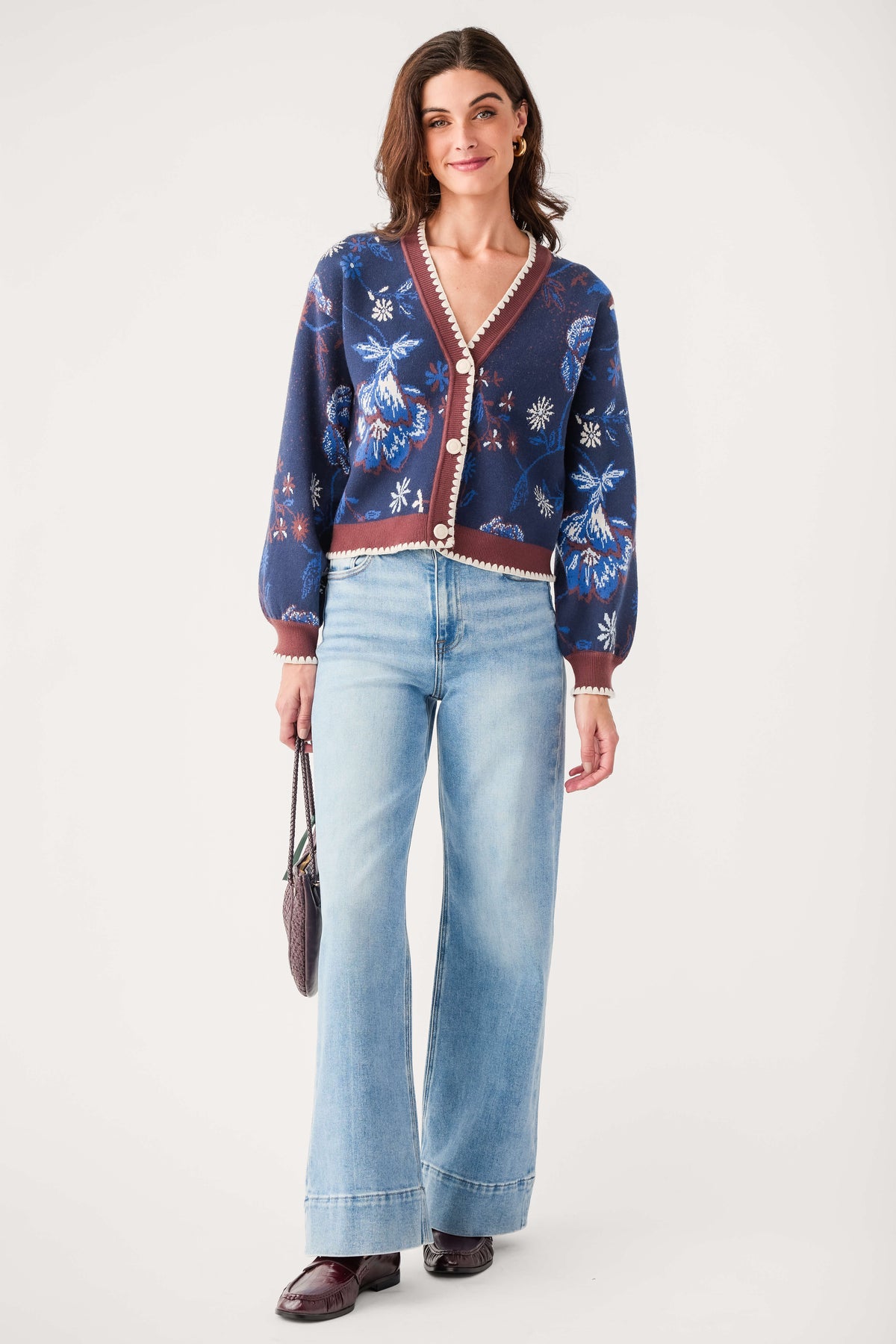 Navy printed contrast cardigan with button placket, white trim, long sleeves