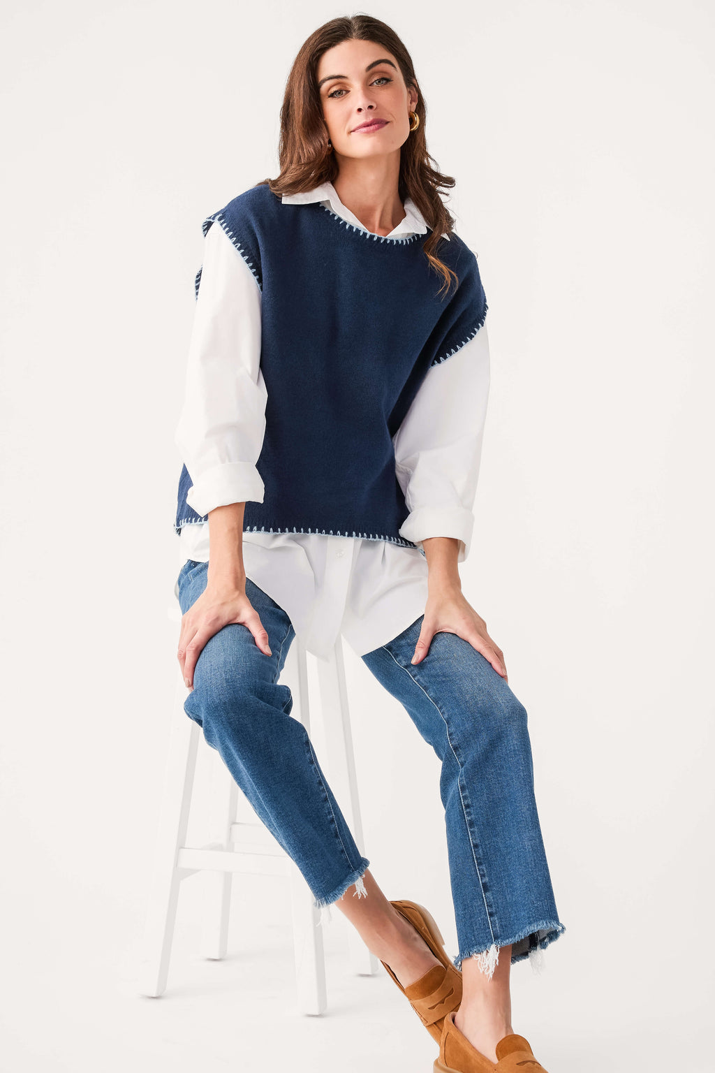 Navy cap sleeve blanket-stitch sweater with contrast white long sleeves