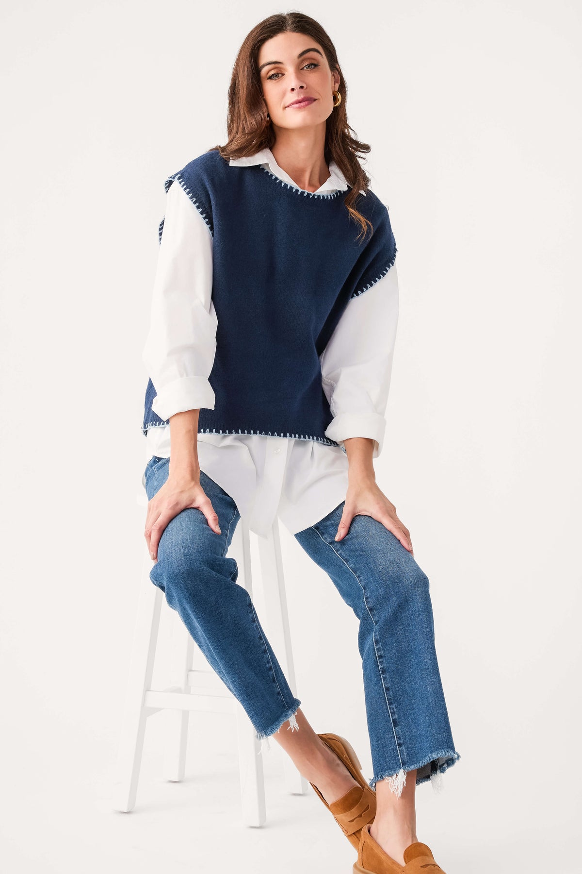 Navy cap sleeve blanket-stitch sweater with contrast white long sleeves