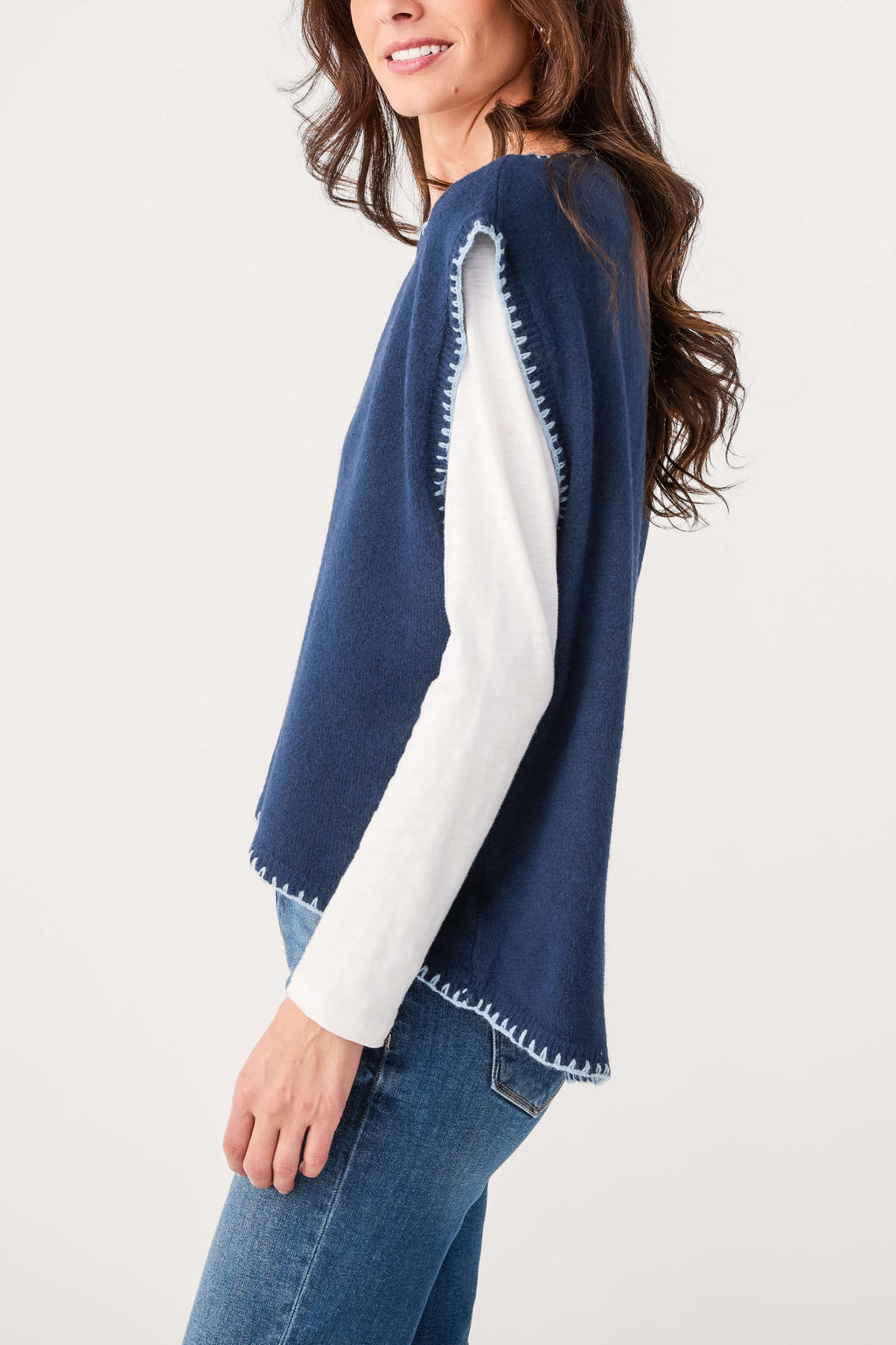 Navy cap sleeve blanket-stitch sweater with contrast white long sleeve panels