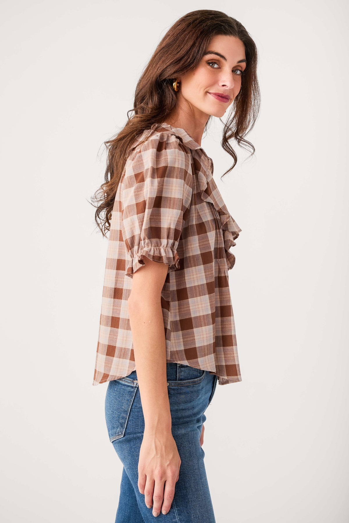 Brown and cream plaid puff-sleeve top with ruffled shoulder detail