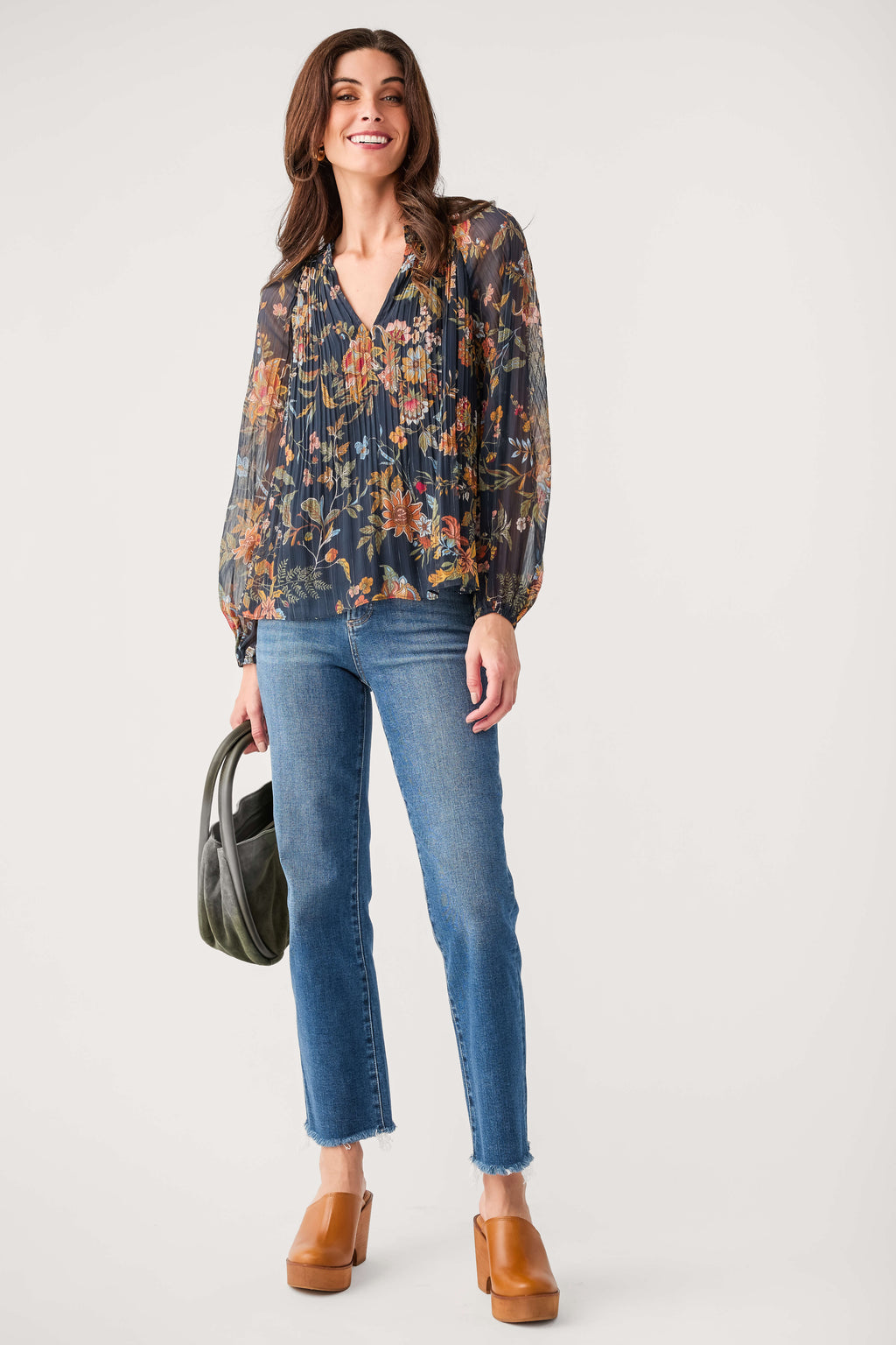 Navy multi floral pleated blouse with V-neck, long sleeves, and cropped length