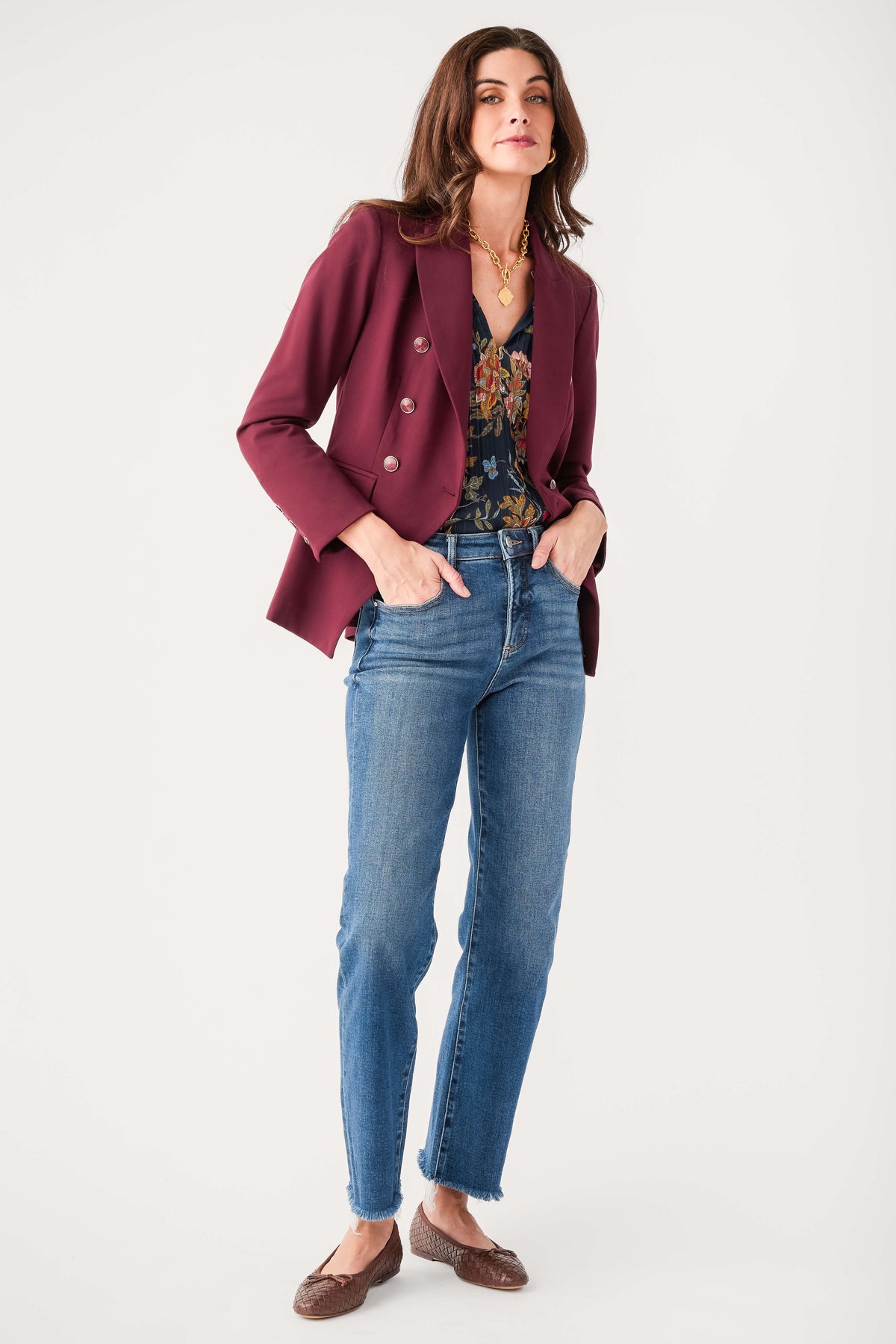 Burgundy double-breasted blazer with peaked lapels and front buttons
