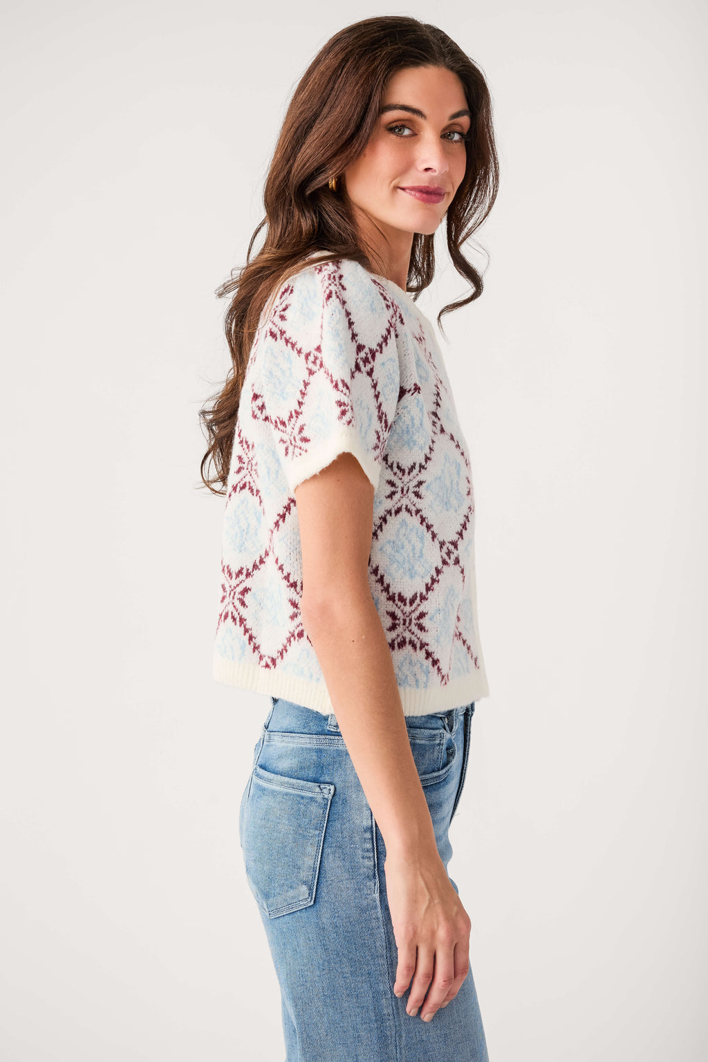 Ivory short-sleeve sweater top with red and blue floral diamond pattern