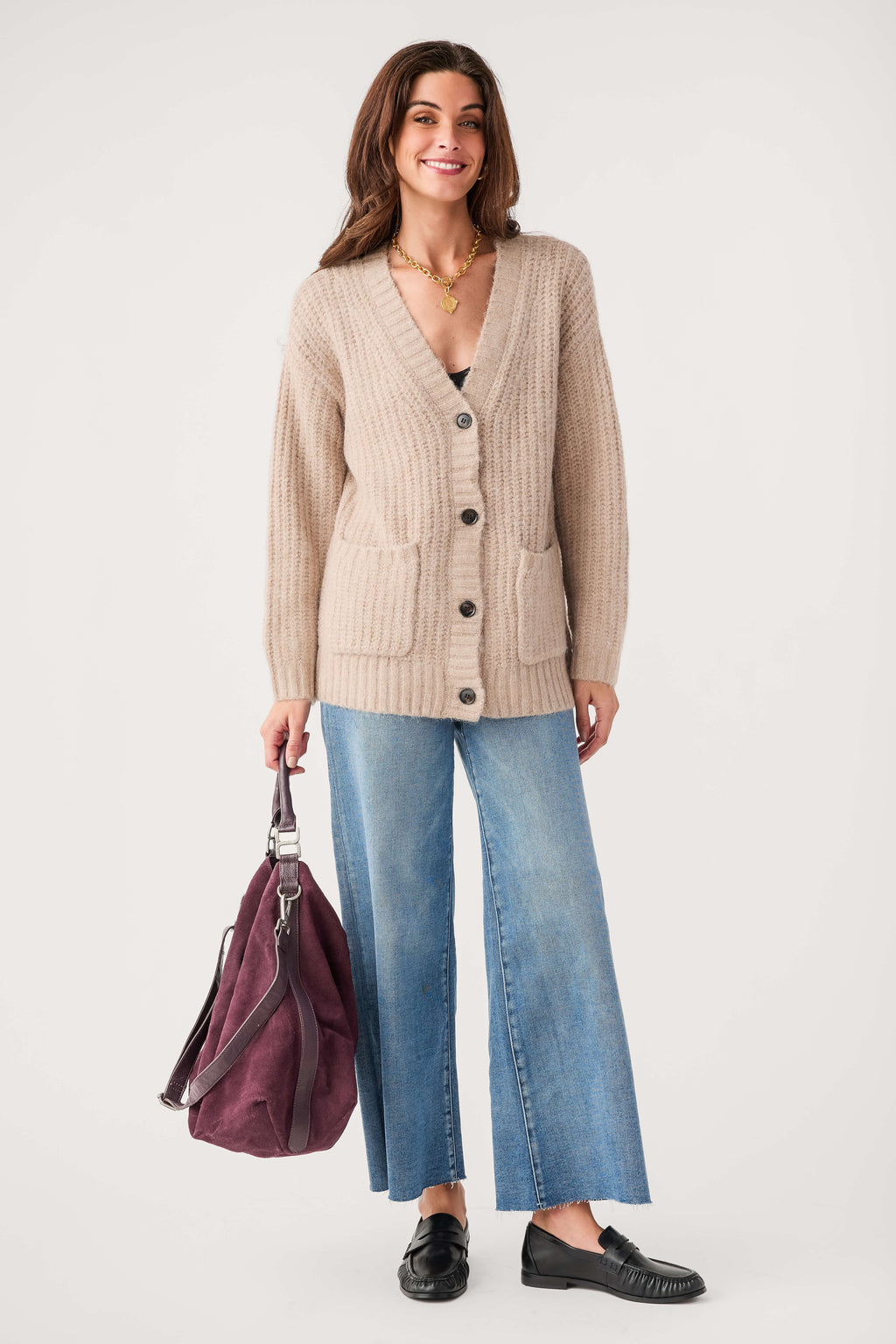Light khaki knit cardigan with button front, V-neck, and patch pockets