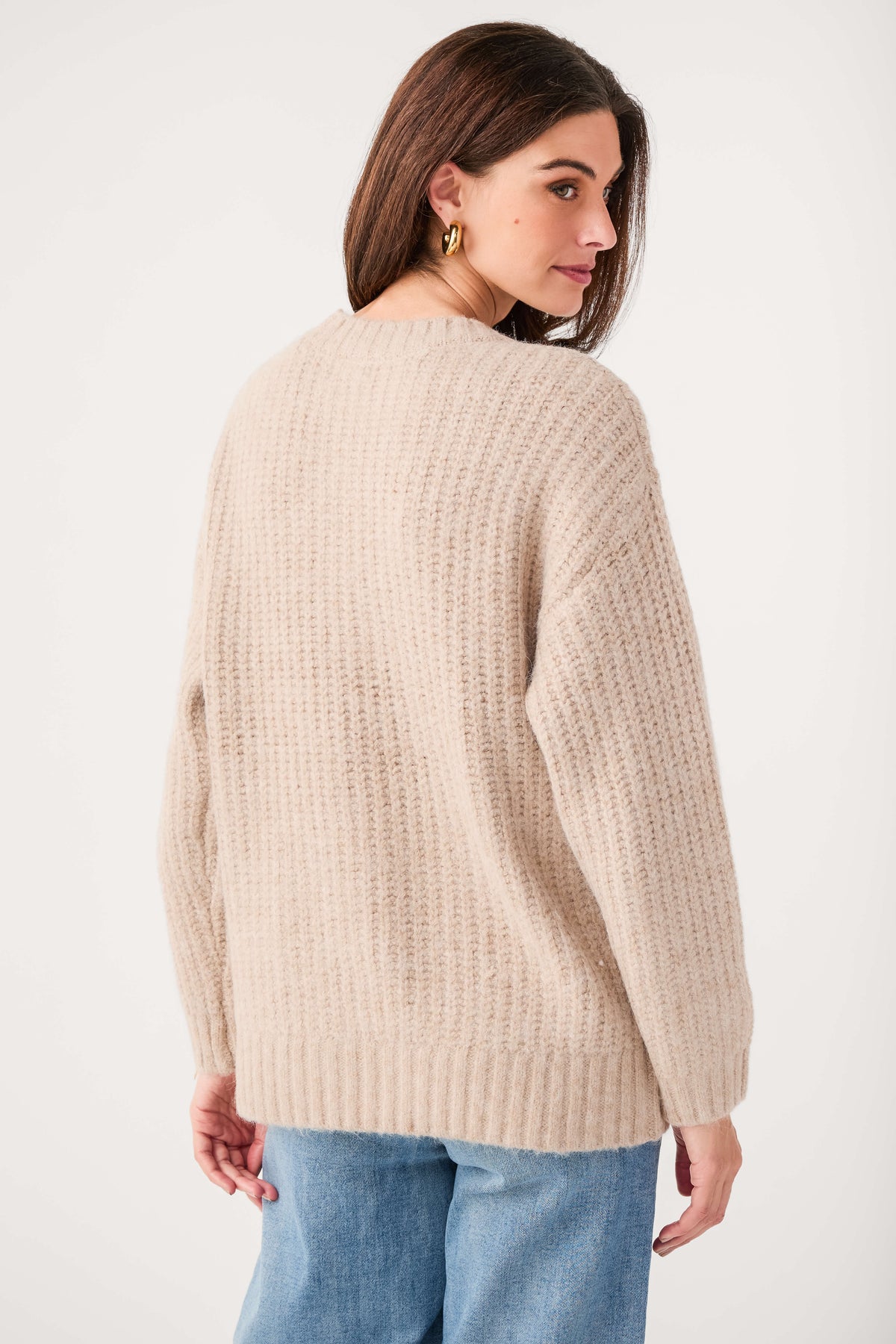 Light khaki knit cardigan back view with ribbed hem and long sleeves