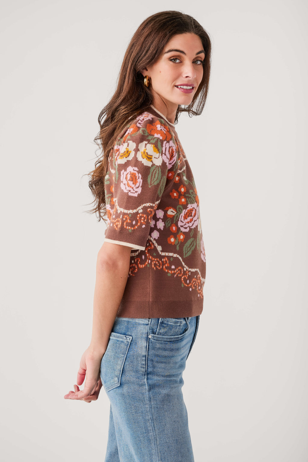 Brown floral knit sweater top, short sleeves, crew neck, side profile