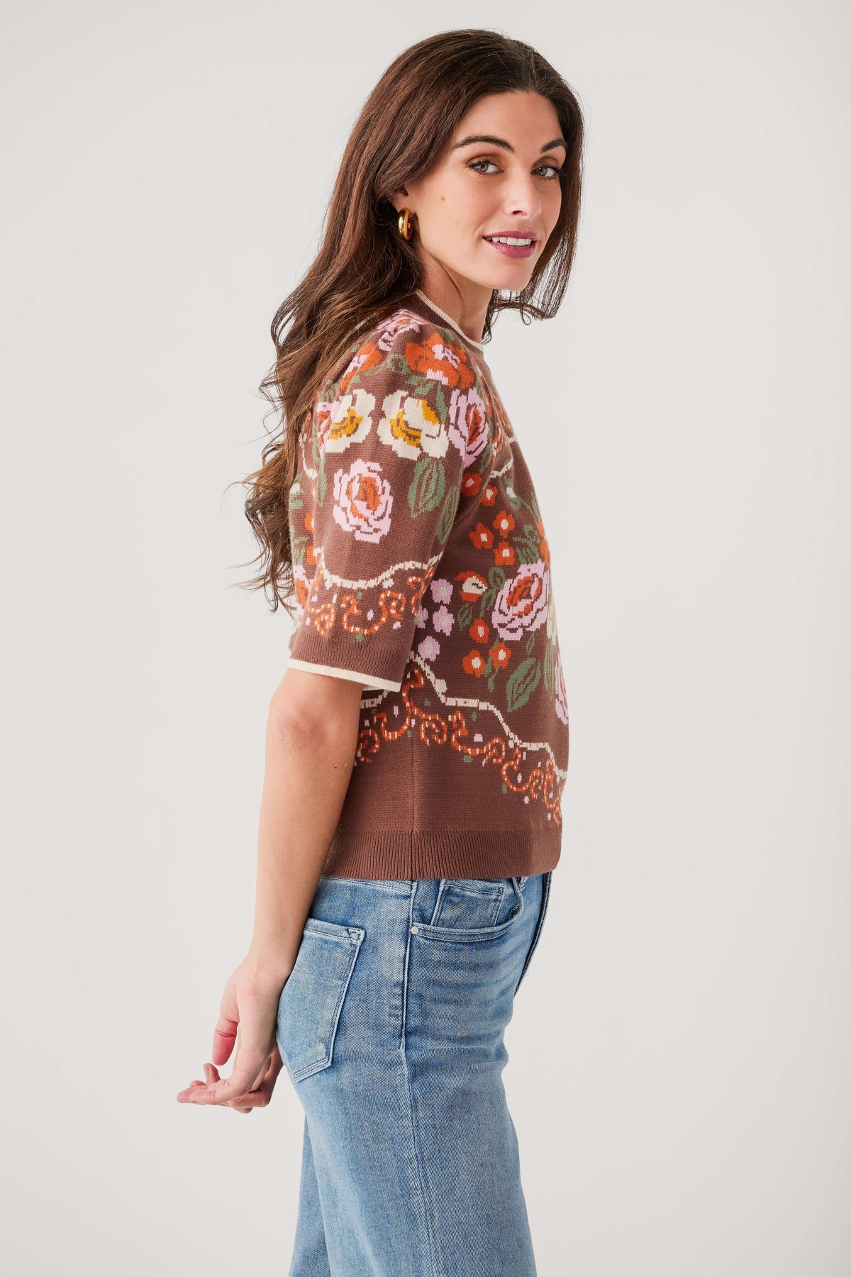 Brown floral knit sweater top, short sleeves, crew neck, side profile