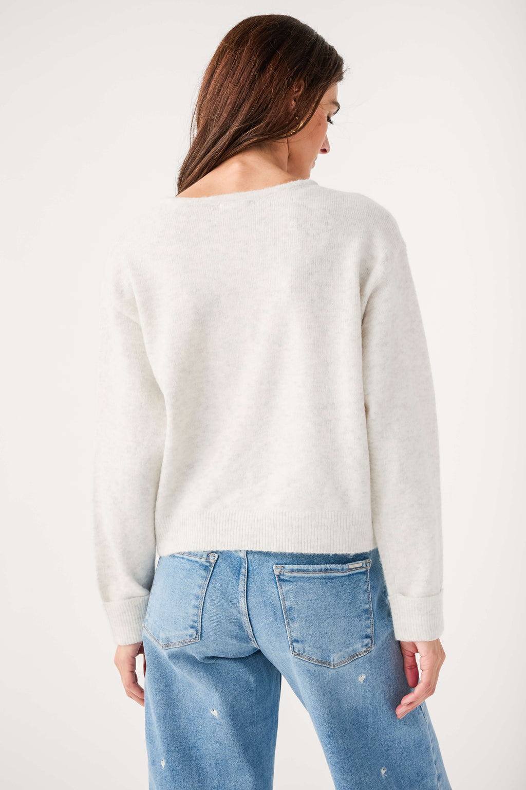 Light gray V-neck knit sweater, back view, long sleeves and straight hem