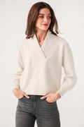 Cream knit shawl-collar V-neck sweater, long sleeves and ribbed detailing