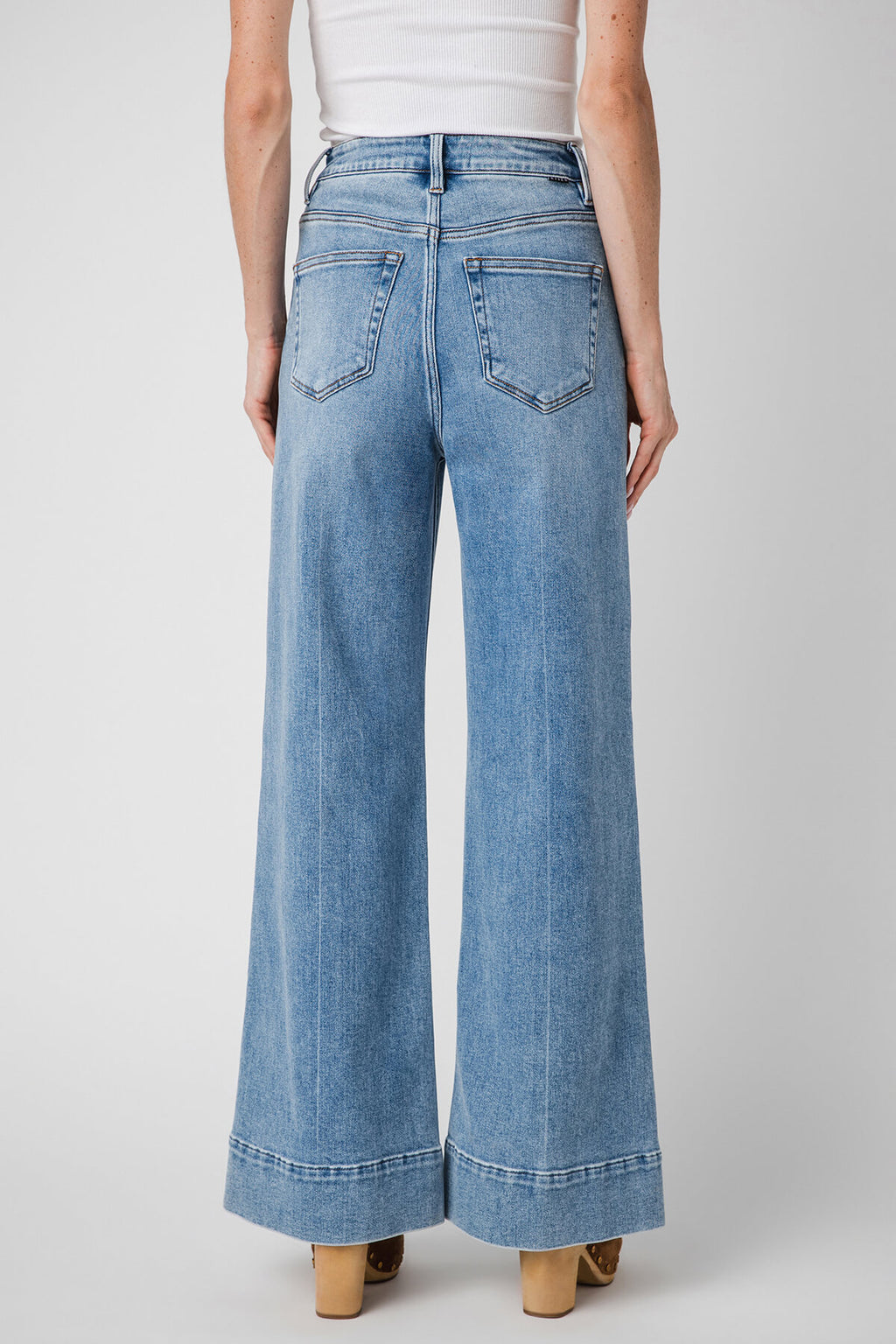 Medium-wash wide-leg denim jeans with belt loops and back welt pockets
