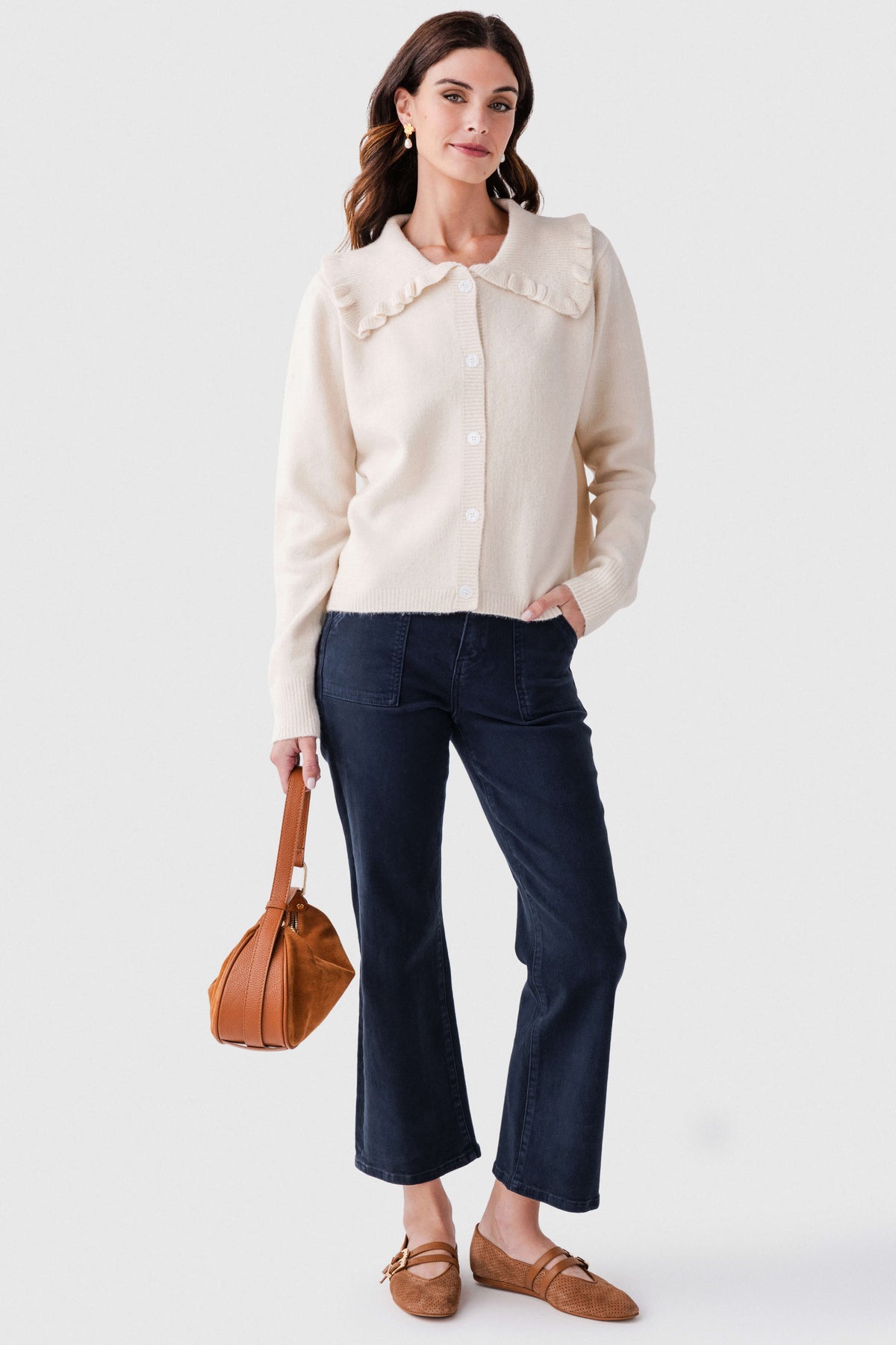 Navy ankle flare jeans with five-pocket design and cuffed ankle hem