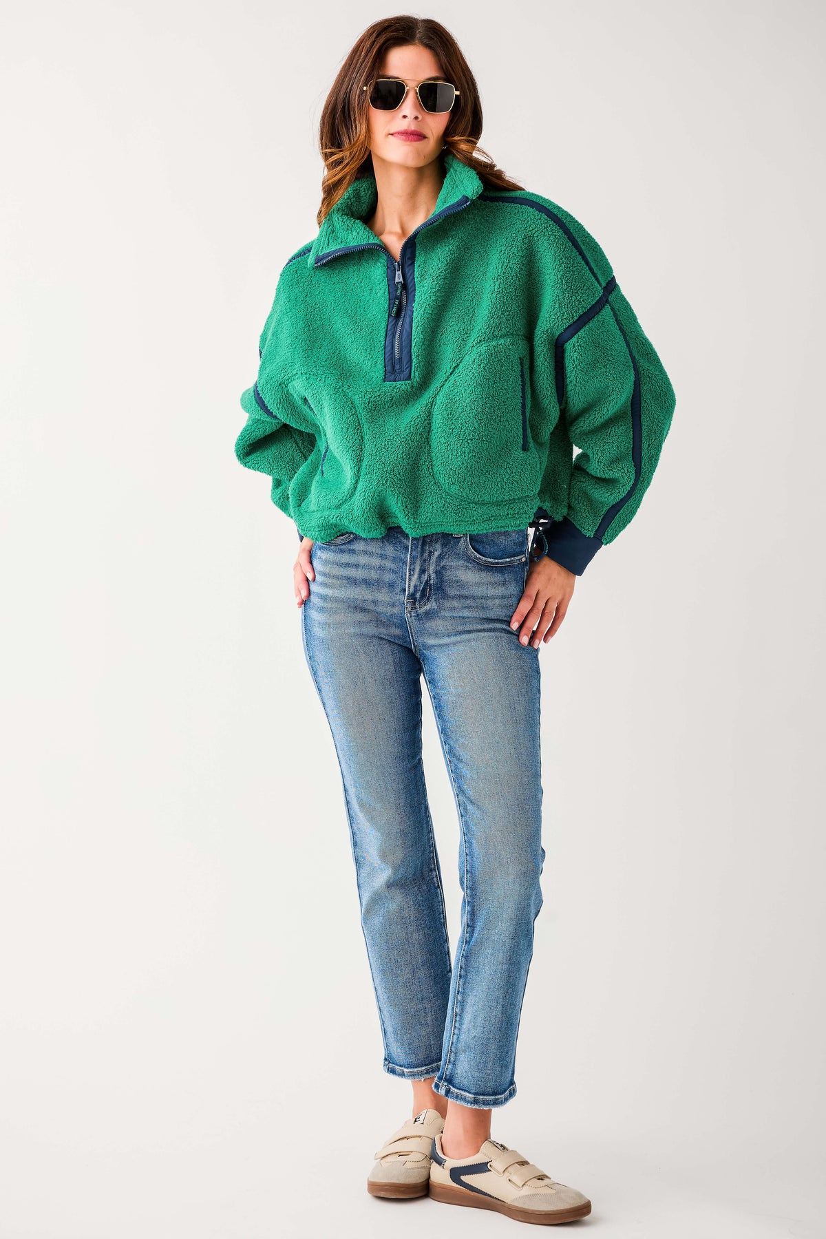 Green 1/2 zip fleece pullover with dark trim panels and side pocket