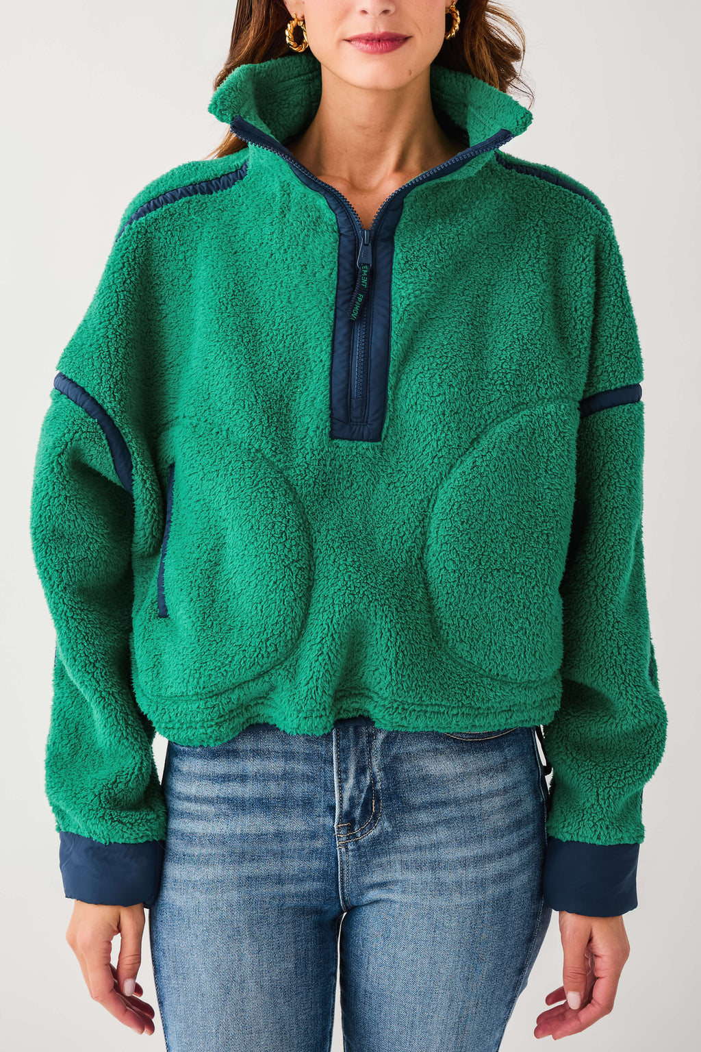 Green fleece 1/2-zip pullover with stand collar and dark zip placket