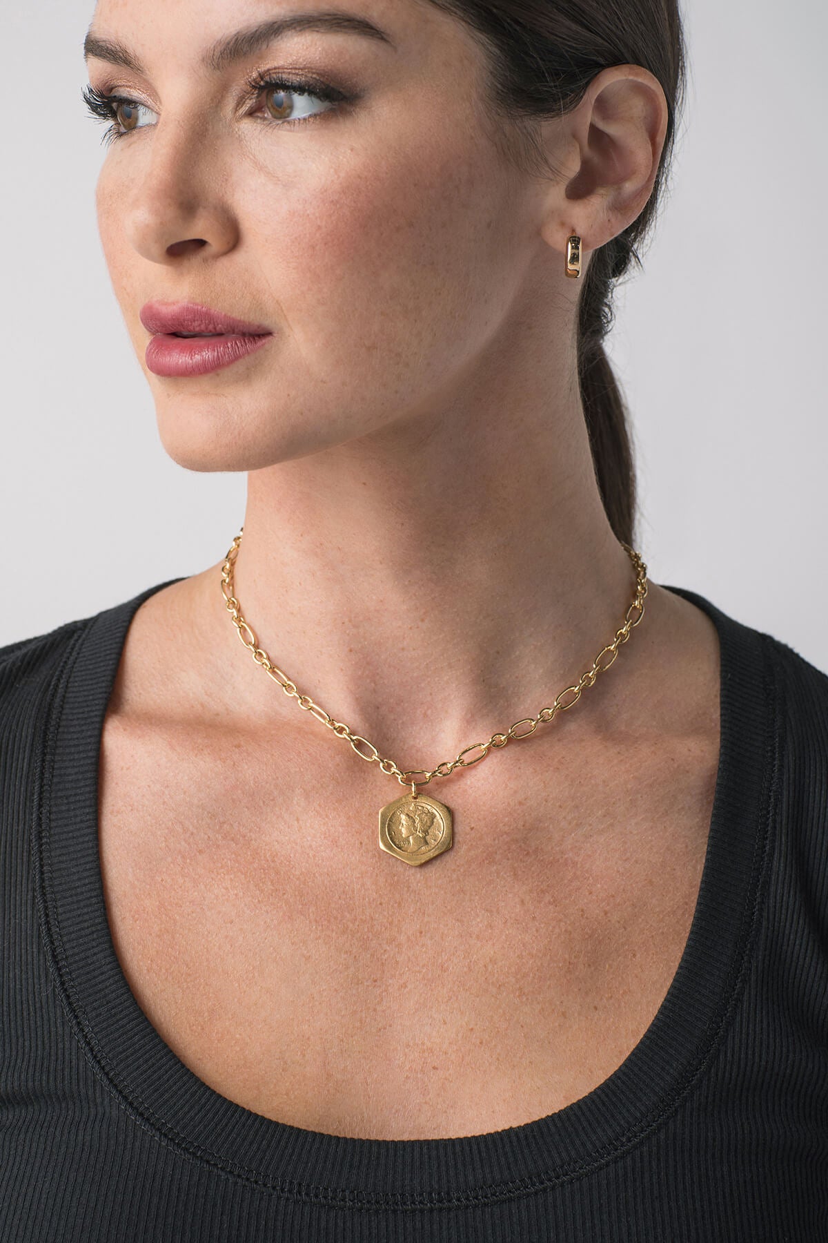 Gold chain necklace with hexagon pendant
